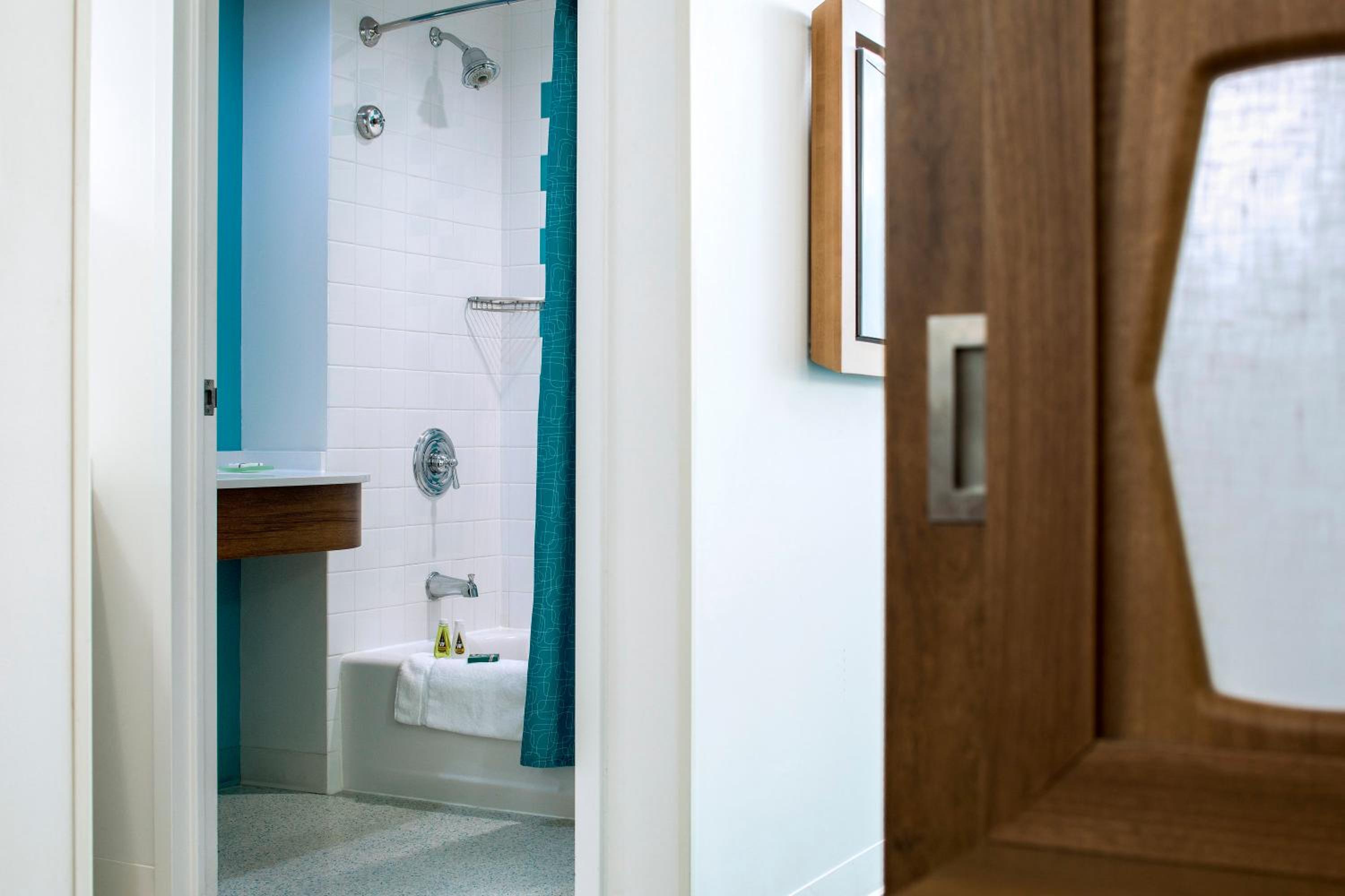 Family Suite with Partial Pool View - Exterior Entry (Includes Early Park Admission)