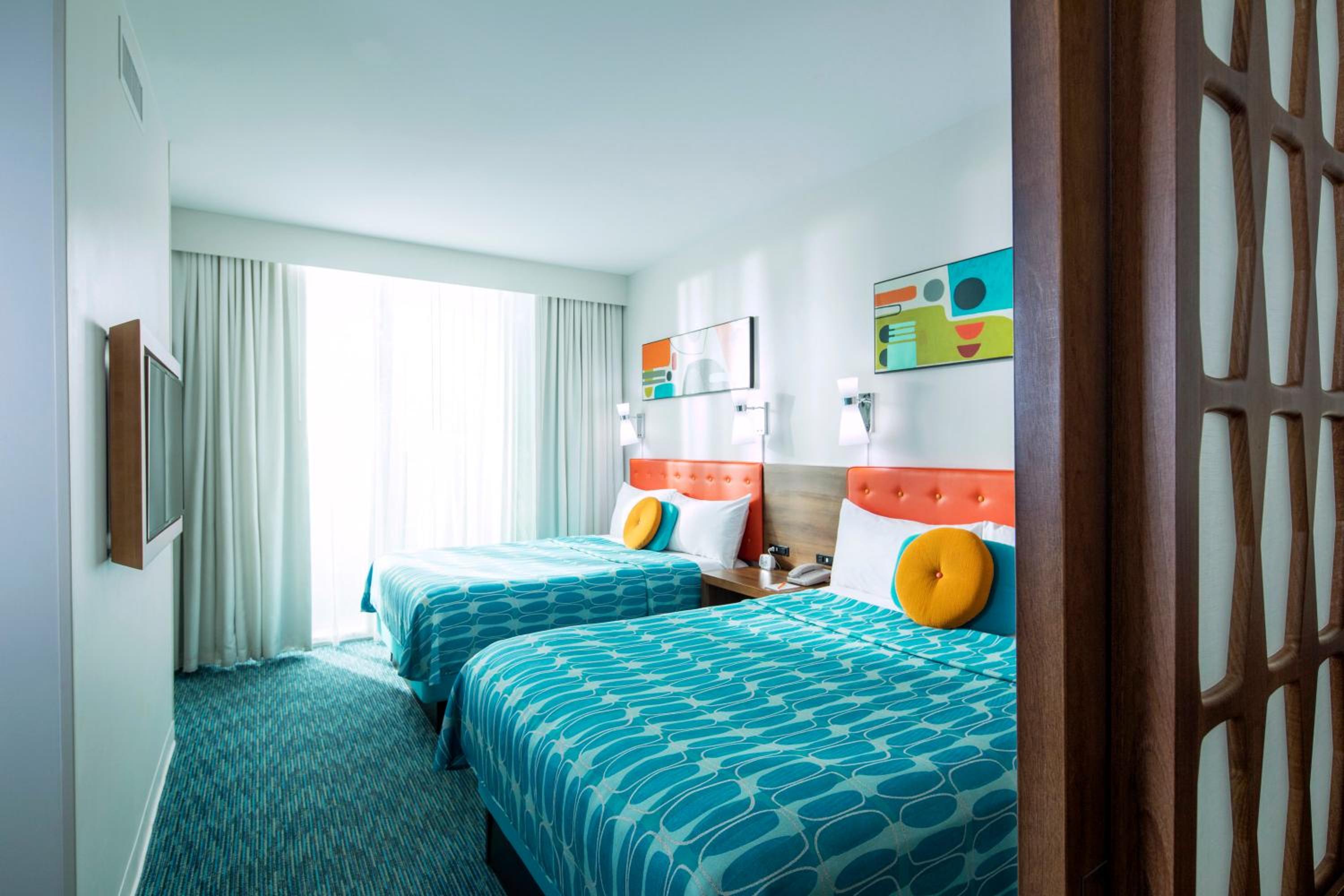 Family Suite with Partial Pool View - Exterior Entry (Includes Early Park Admission)