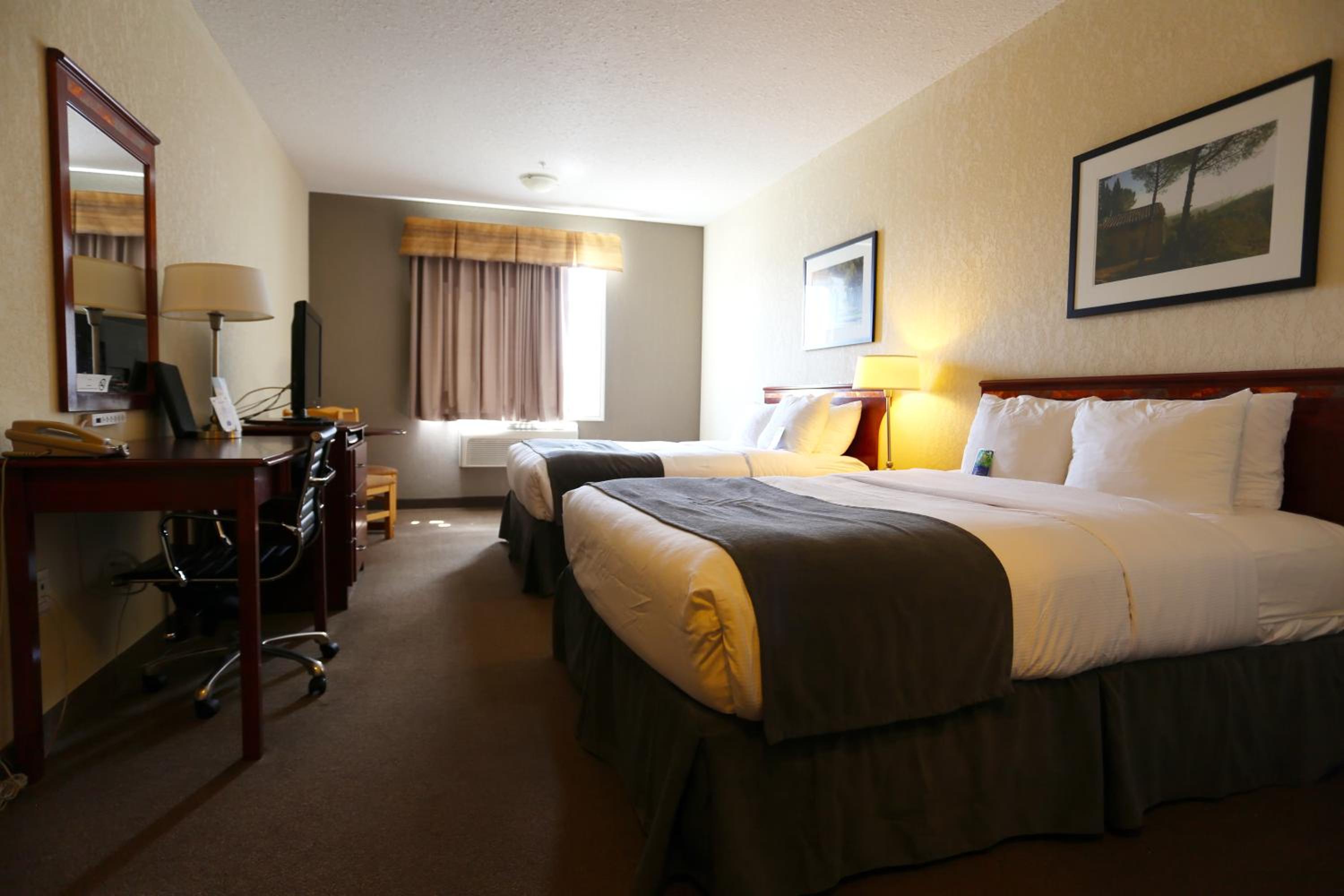 Deluxe Queen Room with Two Queen Beds - Non-Smoking photo 1