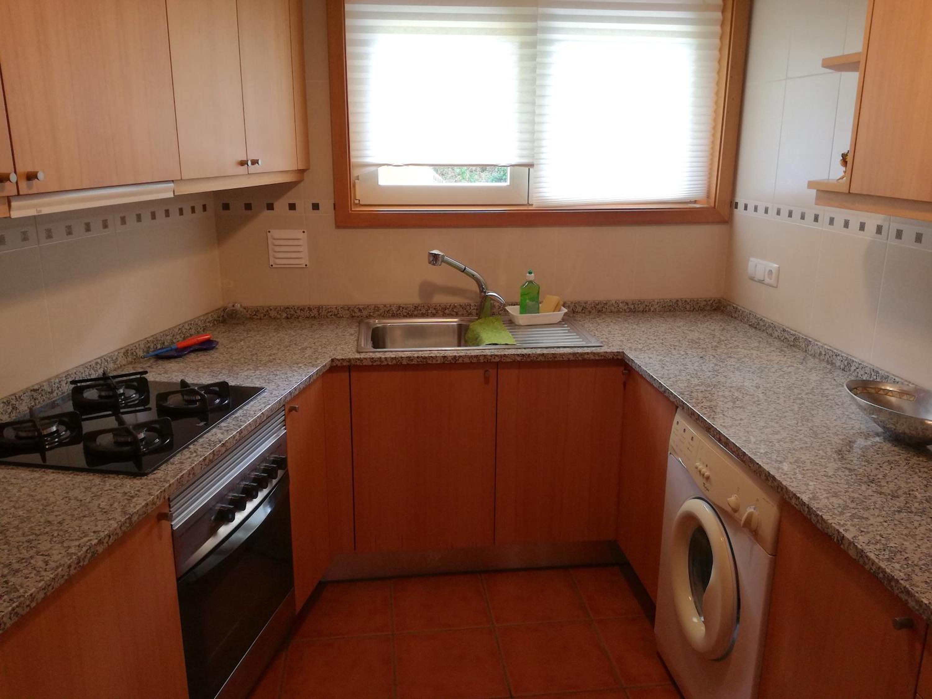 Three-Bedroom House - Photo 29