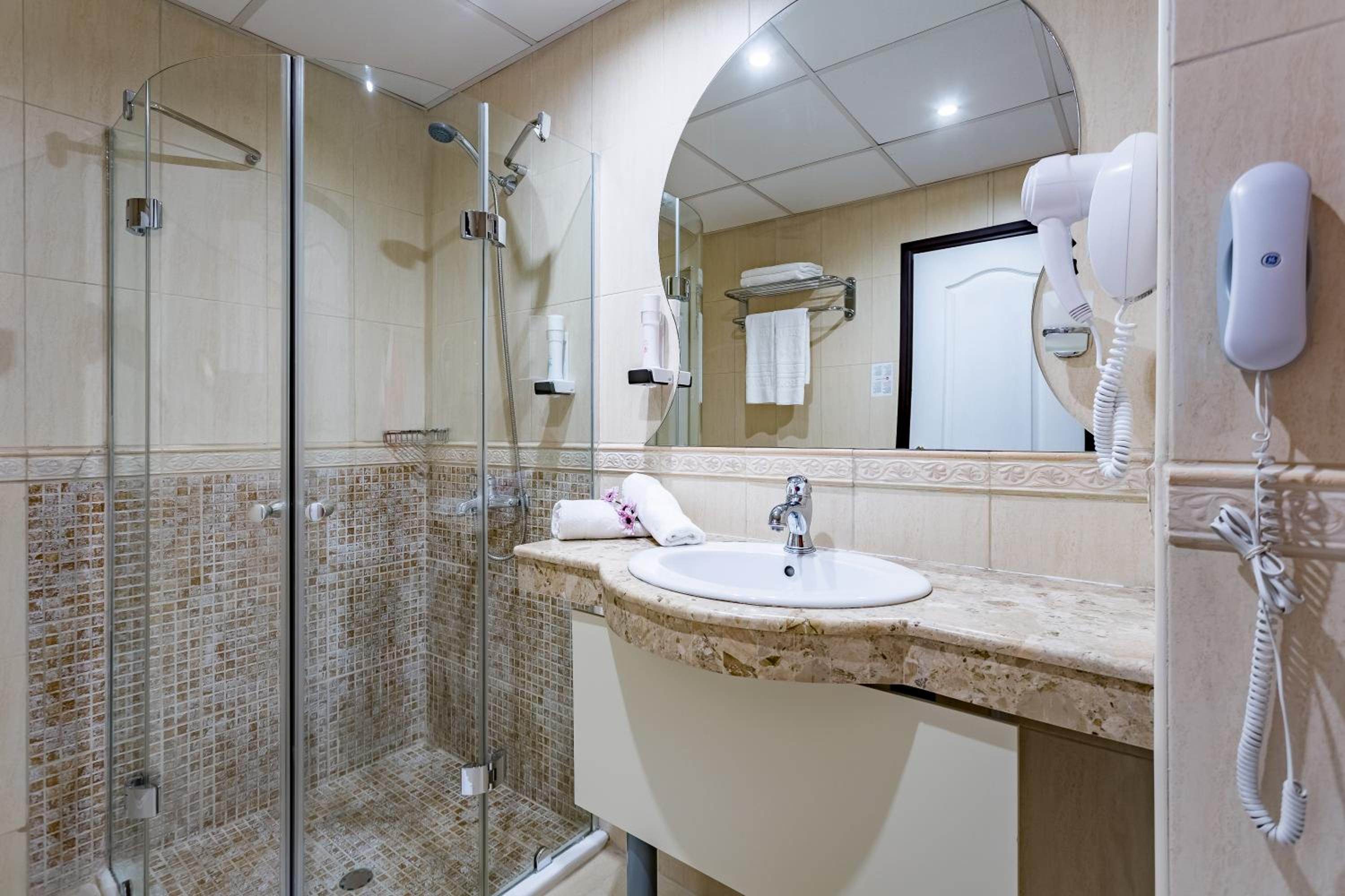 Junior Suite with Side Sea View (3 Adults + 1 Child)