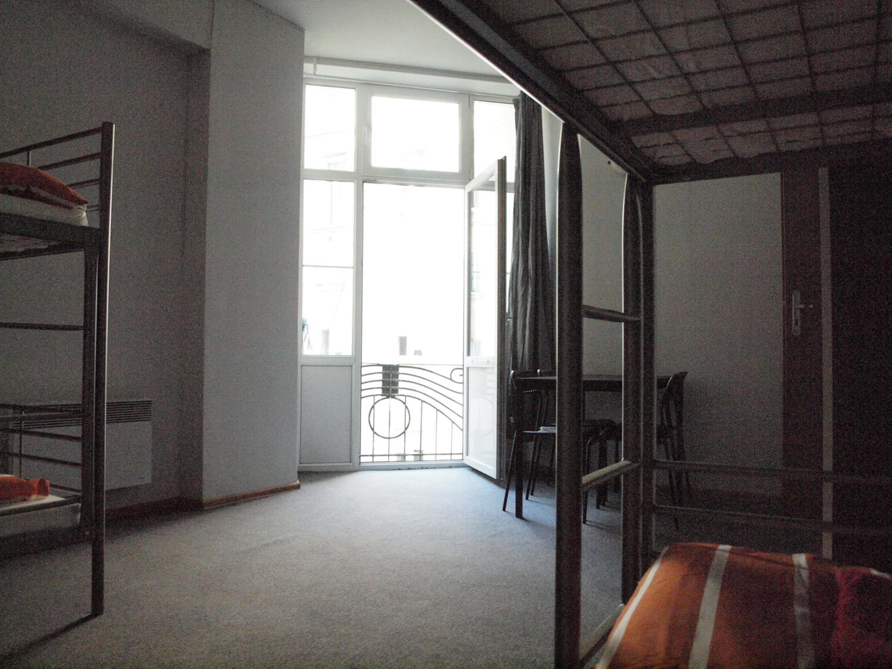 Quadruple Room with Balcony - Photo 1
