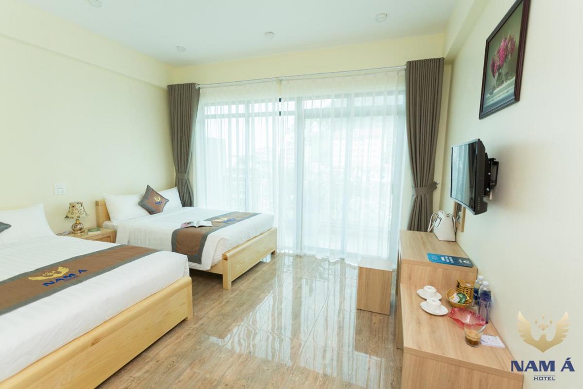 Deluxe Queen Room with Two Queen Beds photo 1