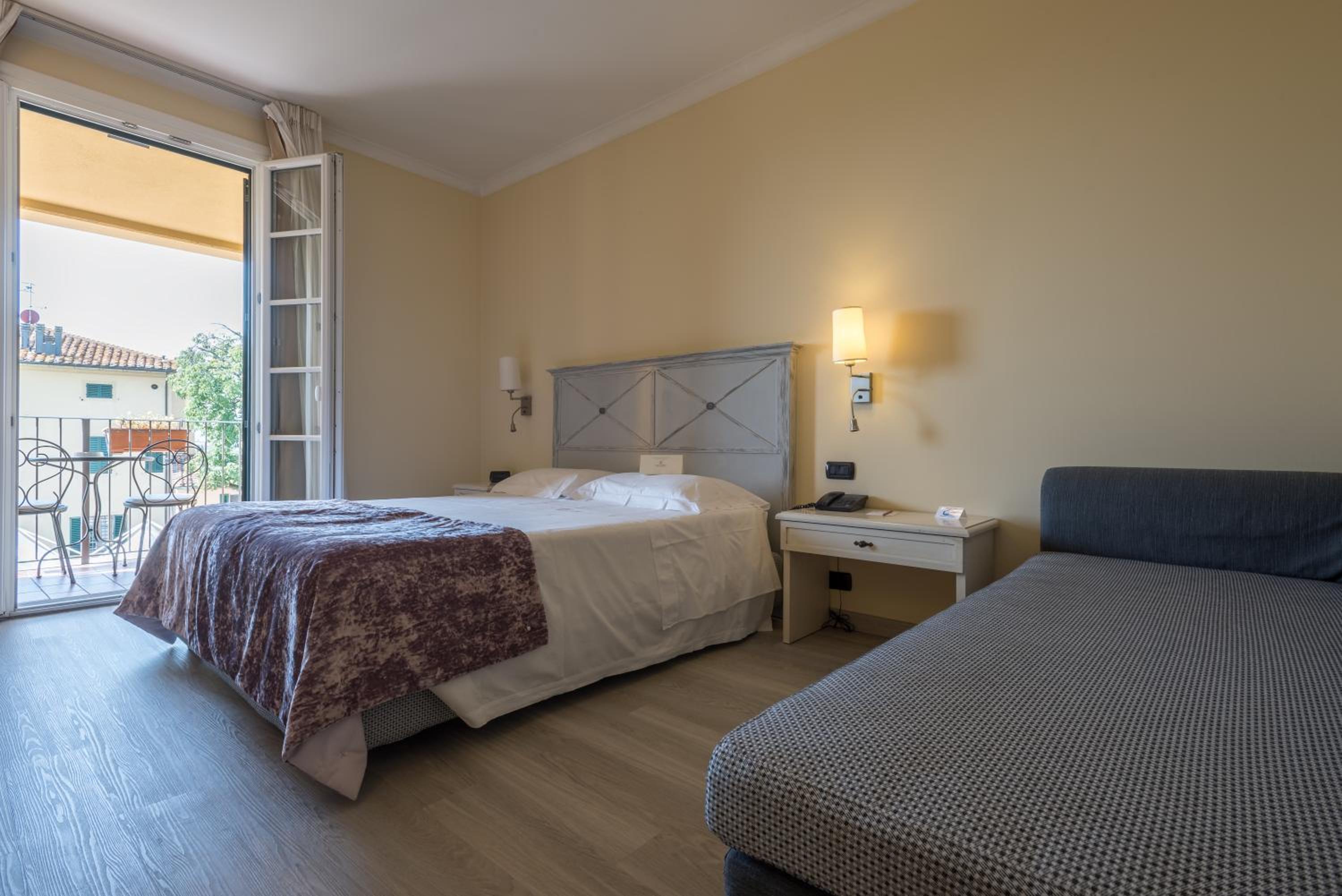 Deluxe Triple Room with Balcony photo 2