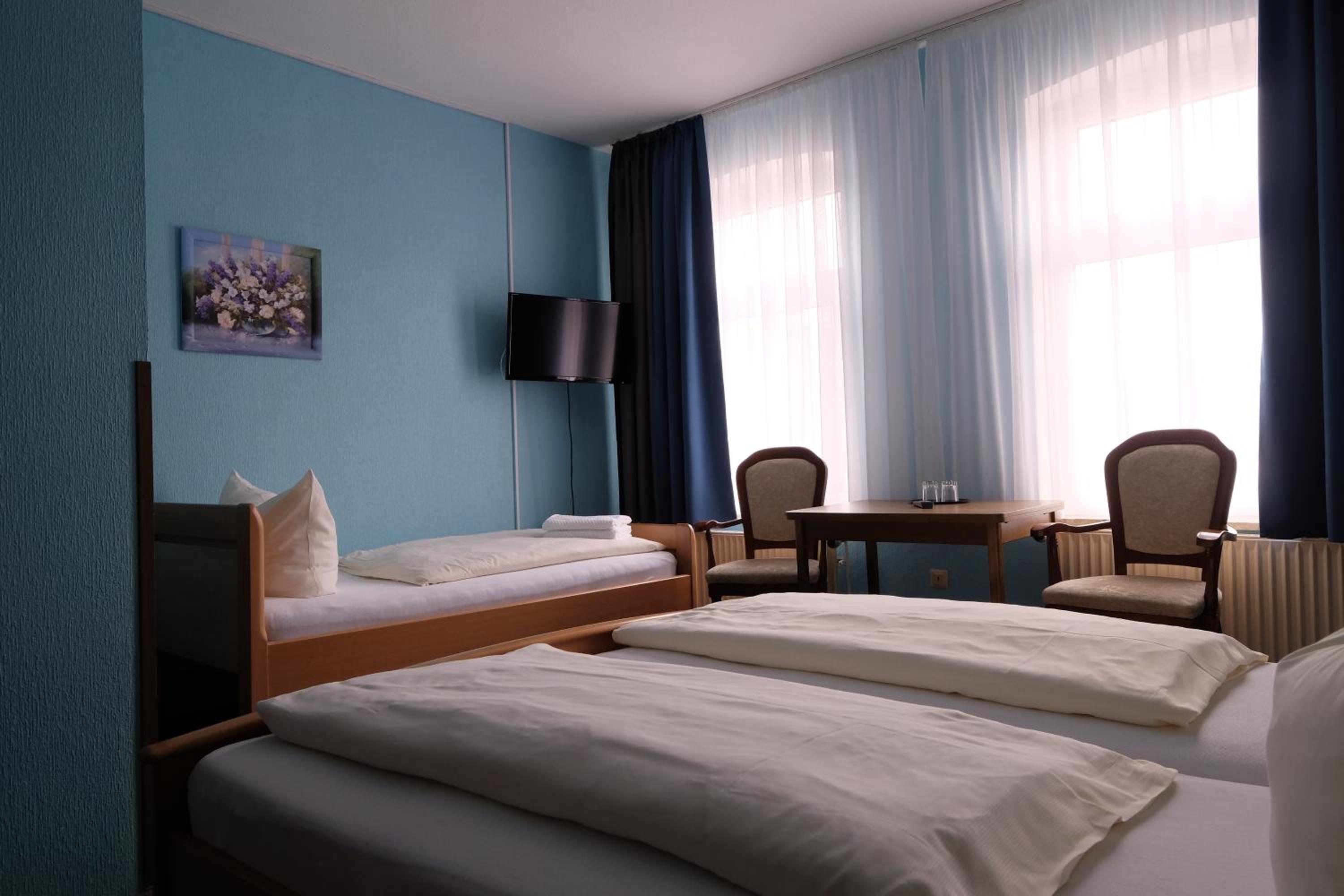Triple Room - Photo 1