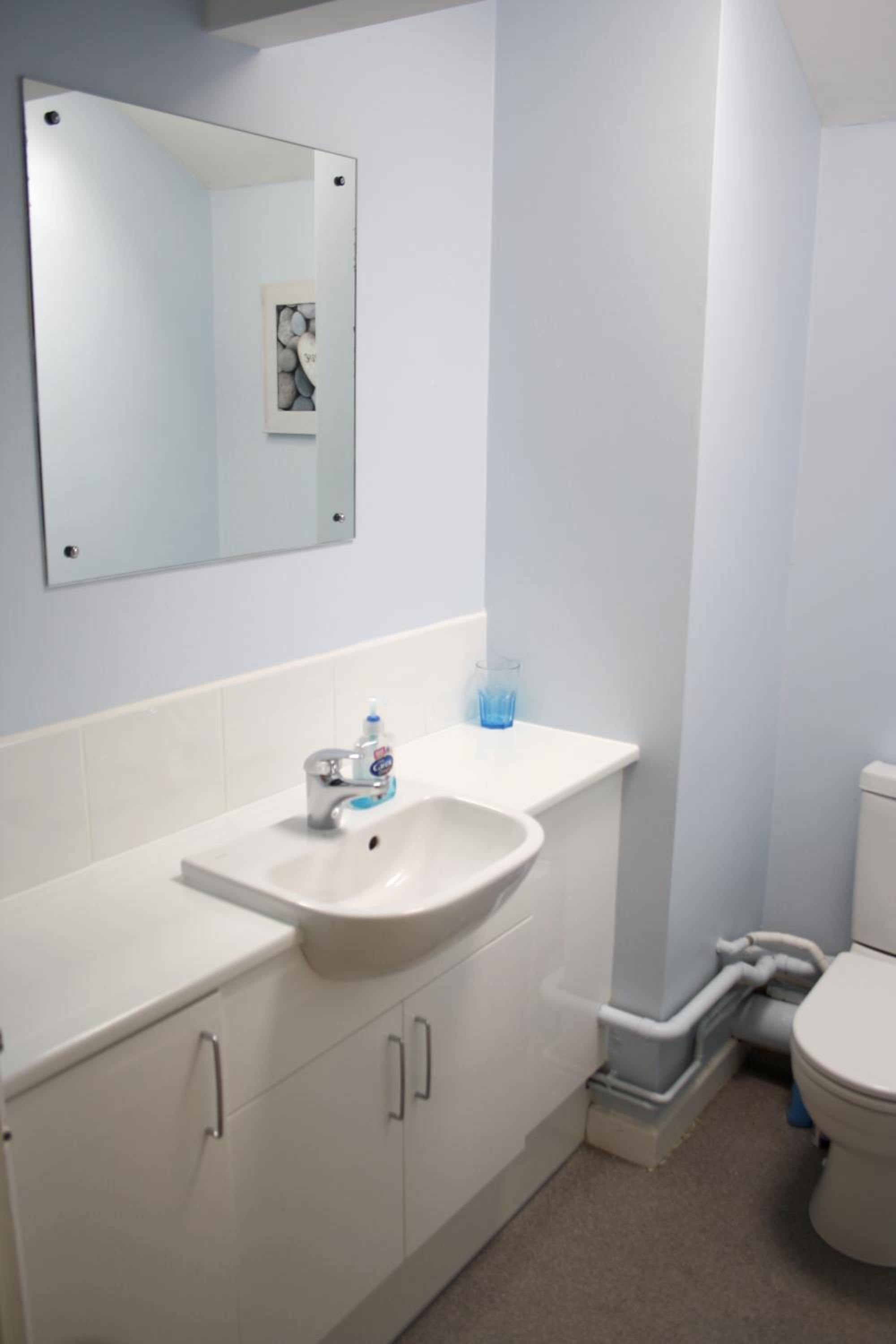 Three-Bedroom Apartment - Photo 31