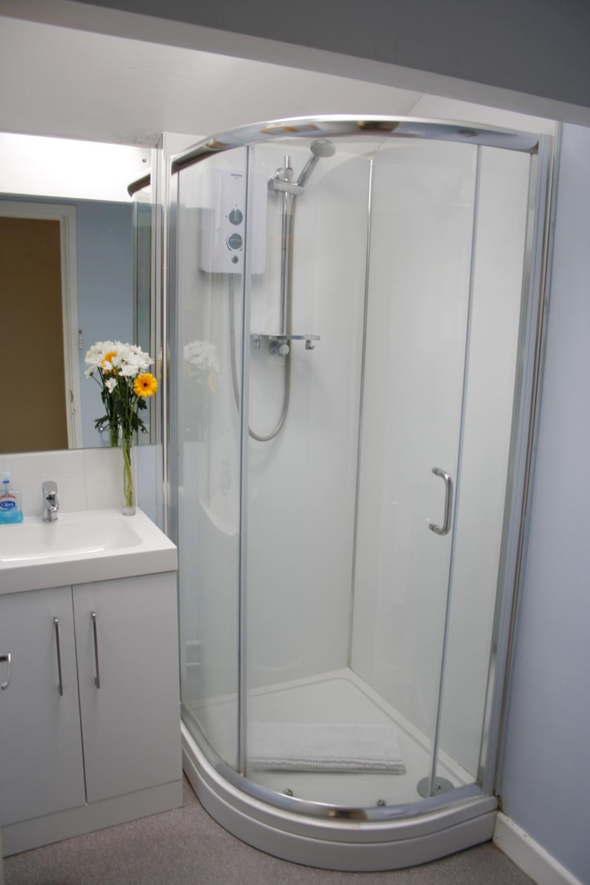 Three-Bedroom Apartment - Photo 32