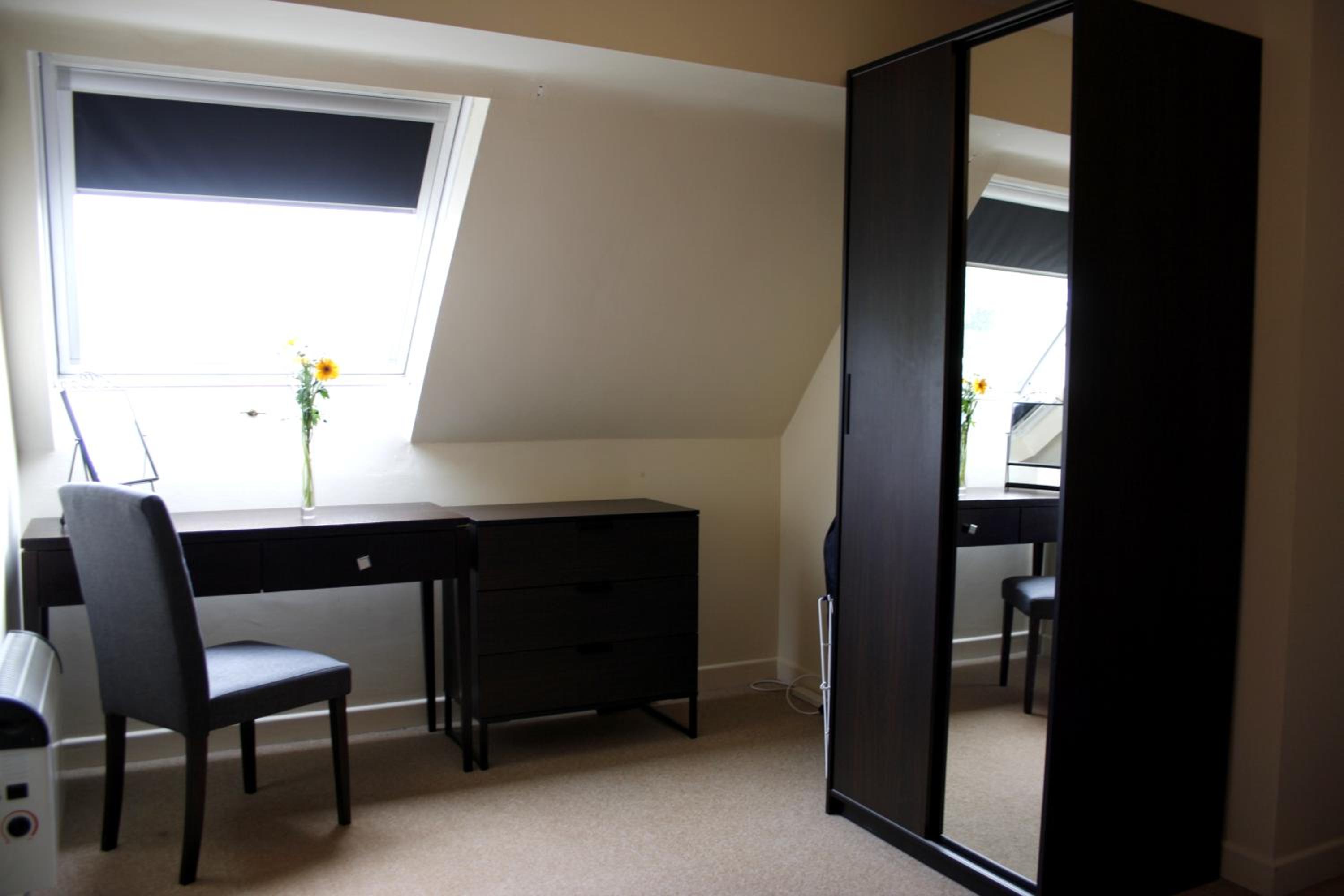 Three-Bedroom Apartment - Photo 3