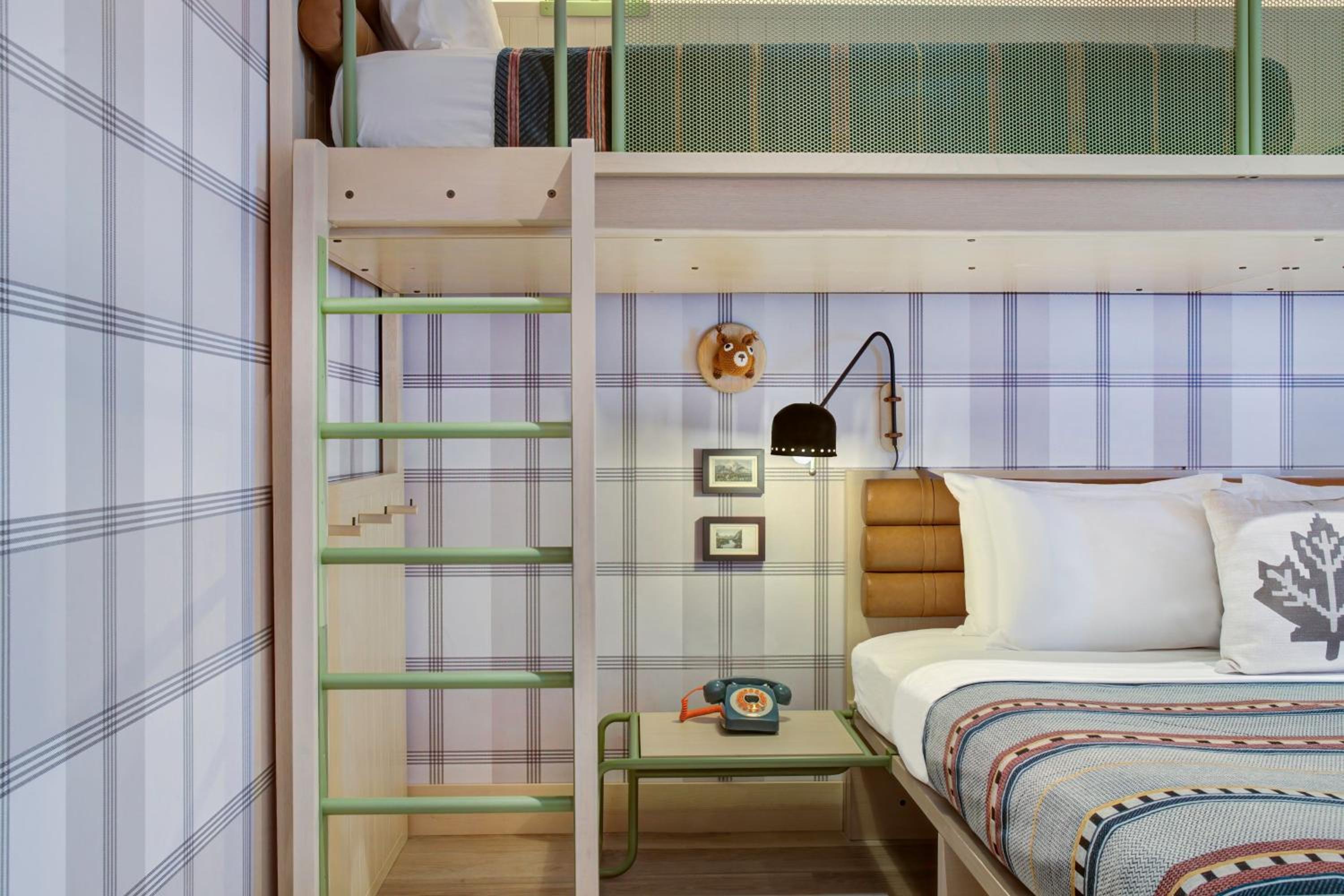 Room with One King Bed and One Set of Bunk Beds