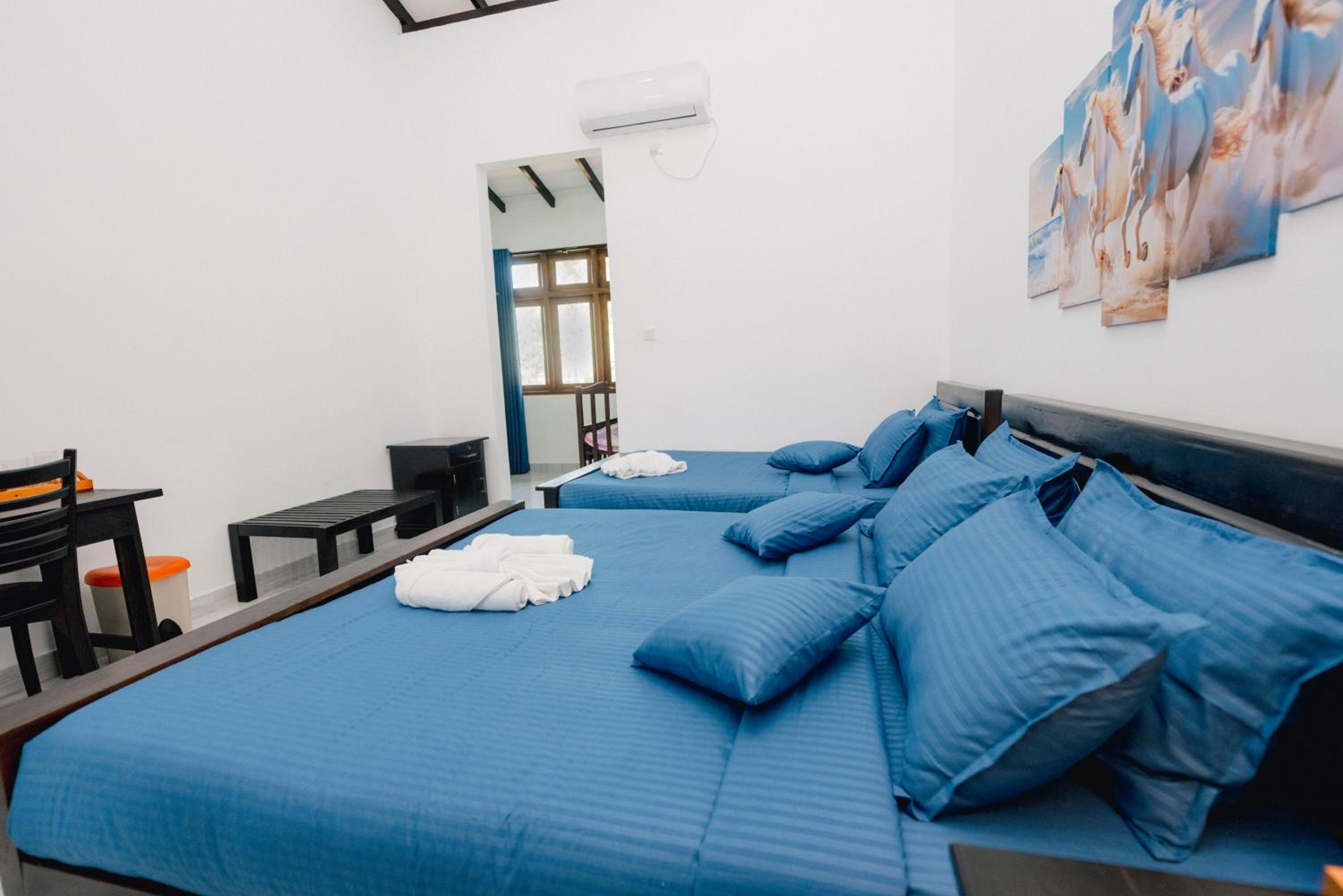 Deluxe Triple Room
