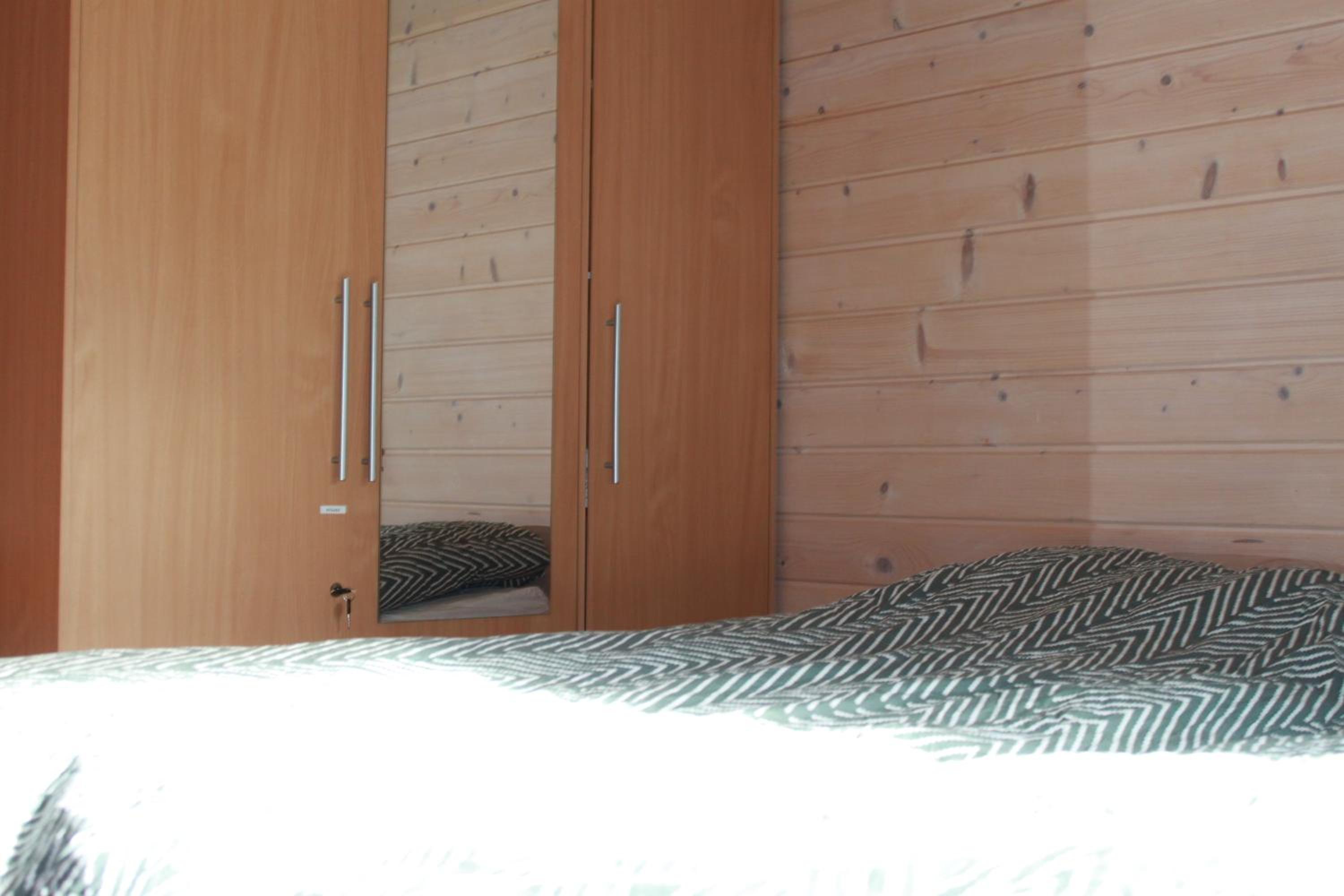 Three-Bedroom House - Photo 32