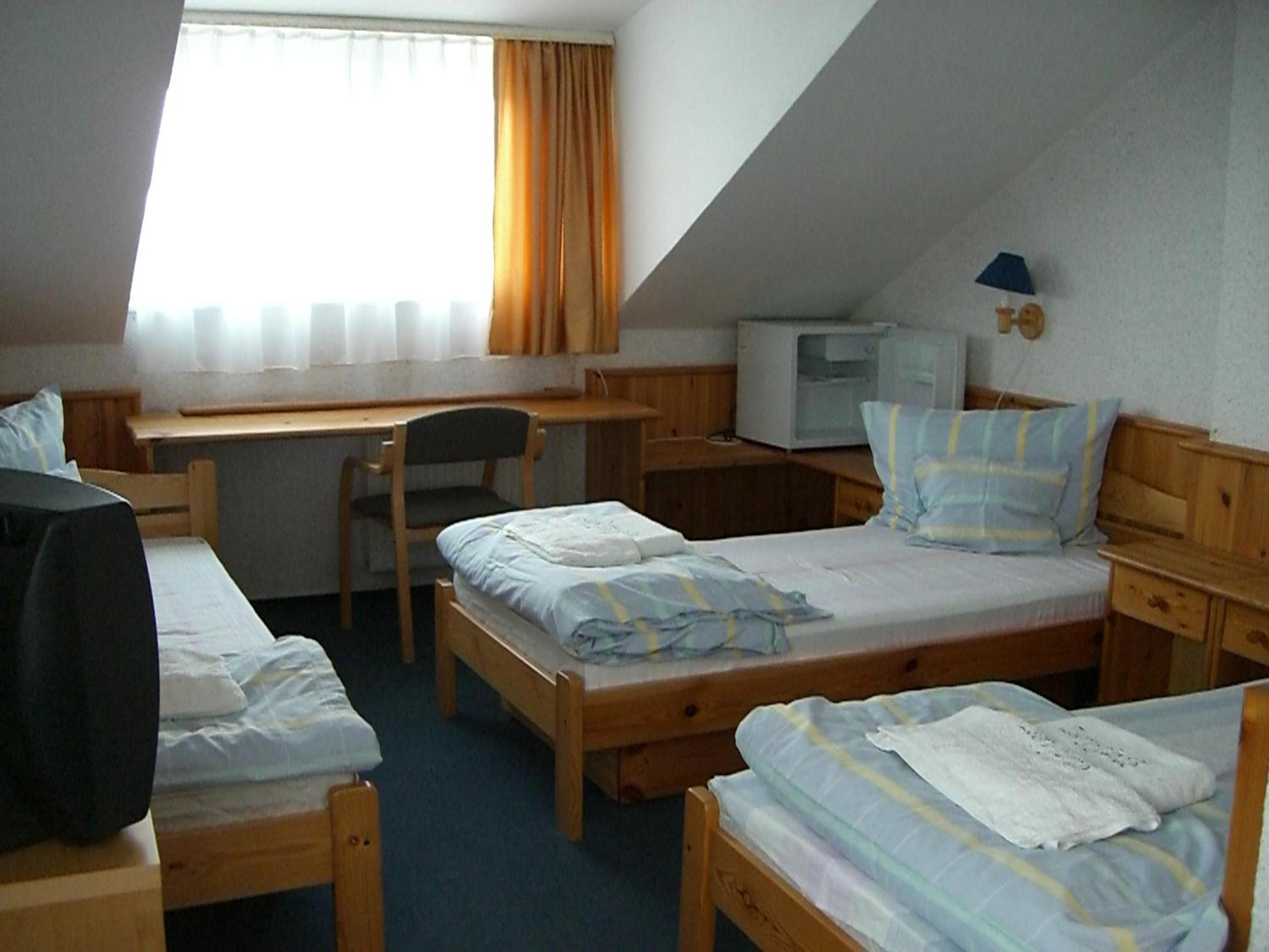Triple Room With Private Bathroom photo 1