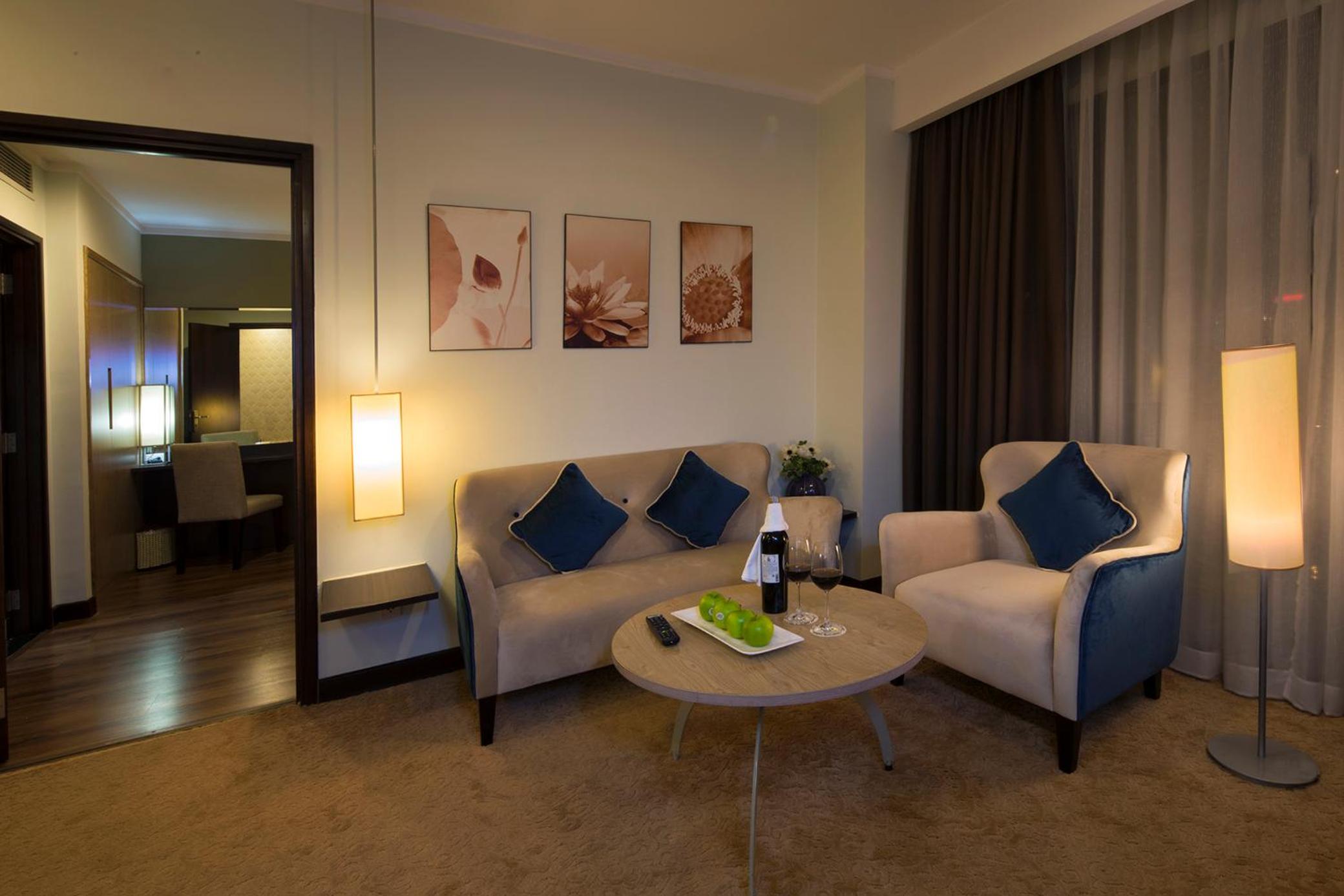 Deluxe Suite Triple with balcony and city view photo 1