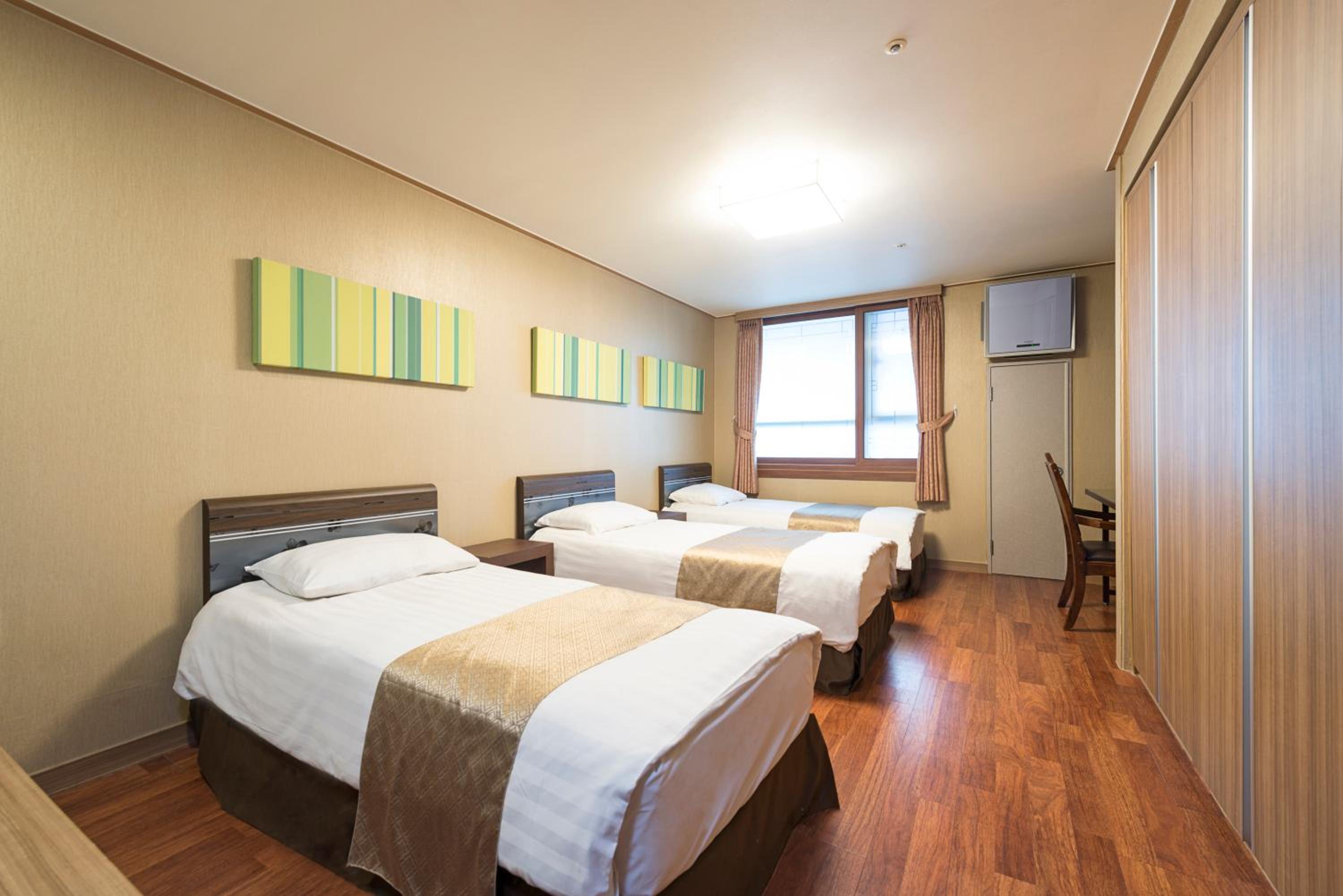 Deluxe Triple Room - Photo 1