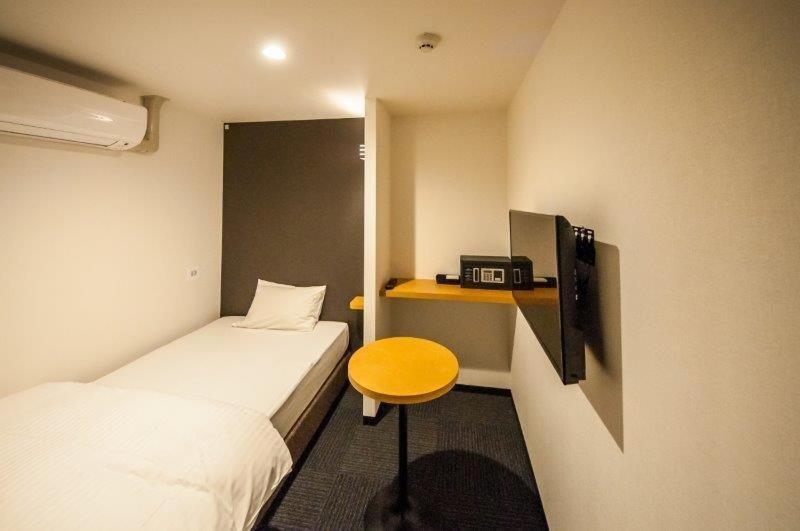 Single Room with Shared Shower and Toilet Male Only - Non-Smoking  photo 1