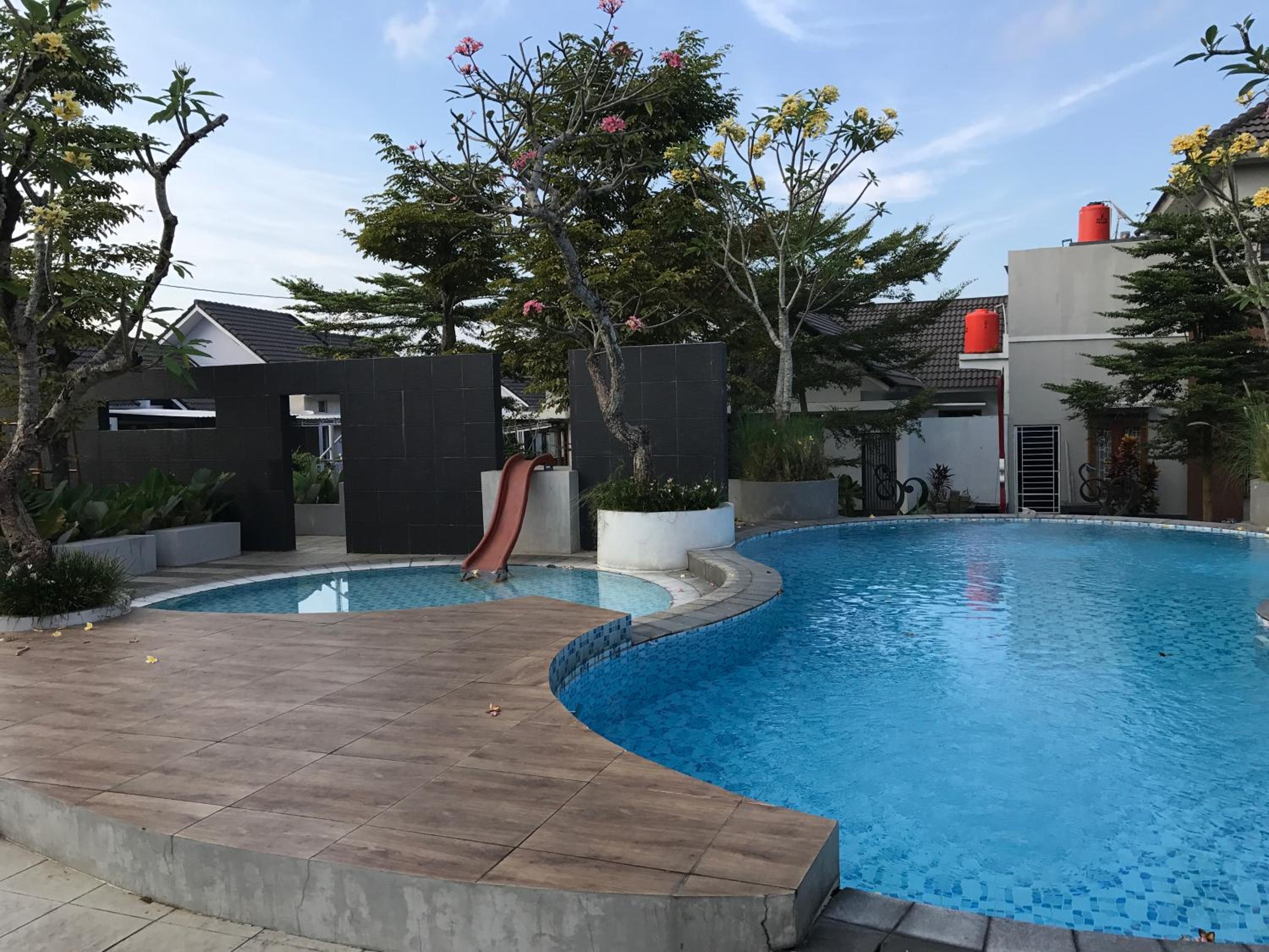 Three-Bedroom House - Photo 17