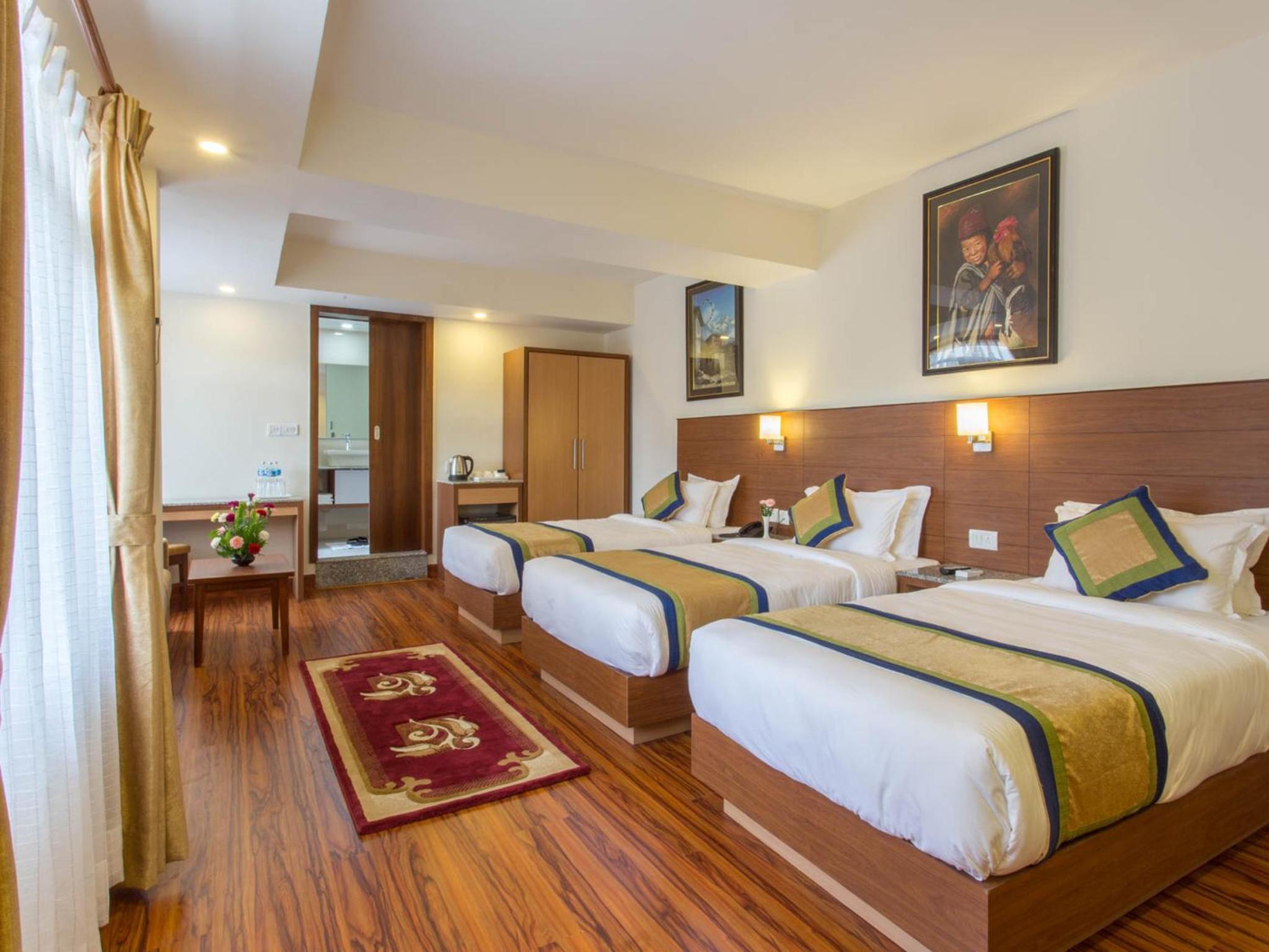 Deluxe Triple Room - Free Airport Pickup