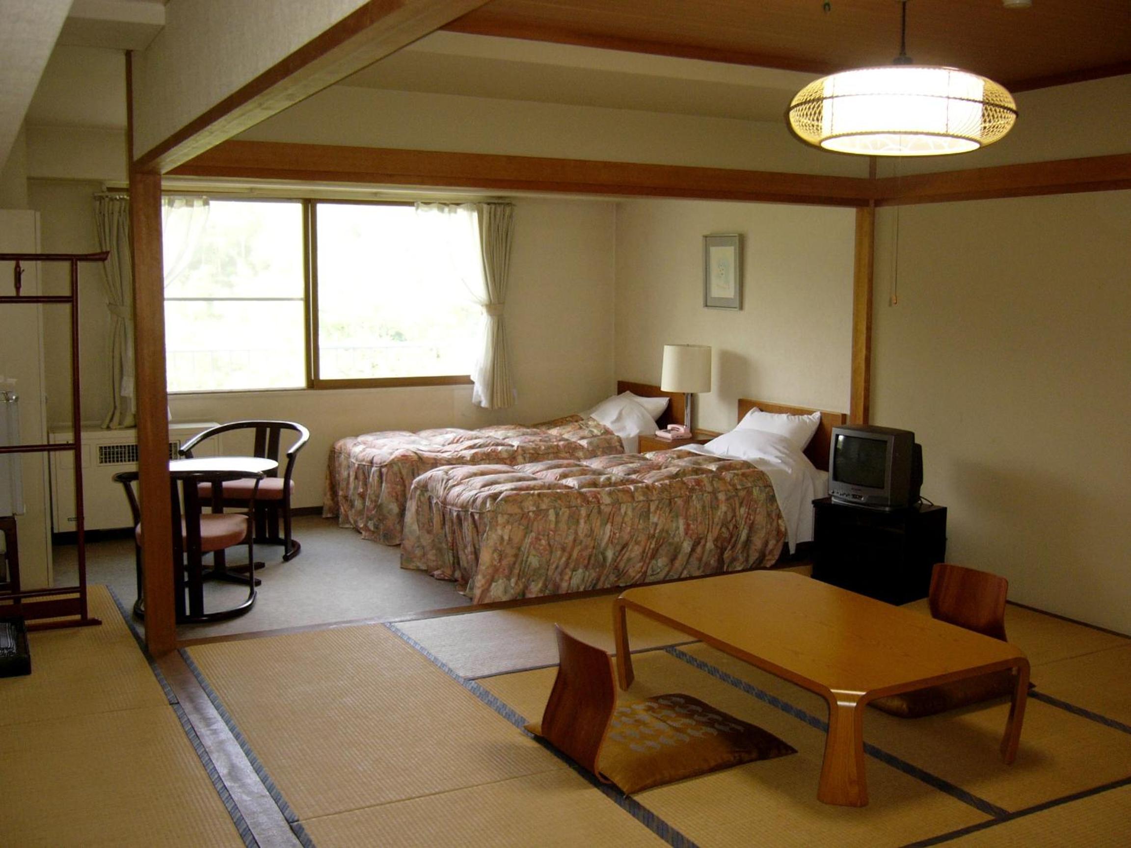 Japanese-Style Room with Tatami Area and Shared Bathroom photo 2