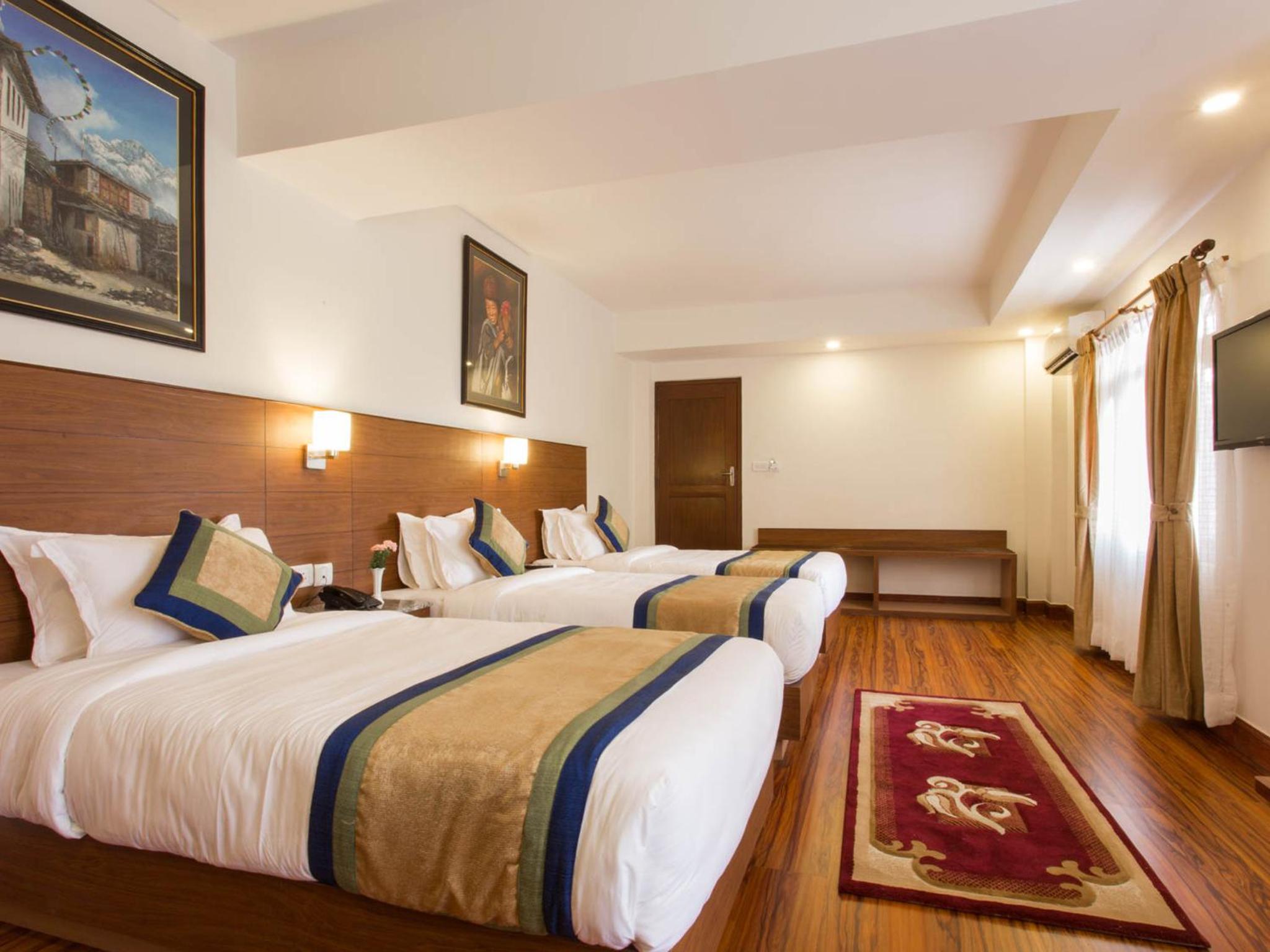Deluxe Triple Room - Free Airport Pickup photo 3