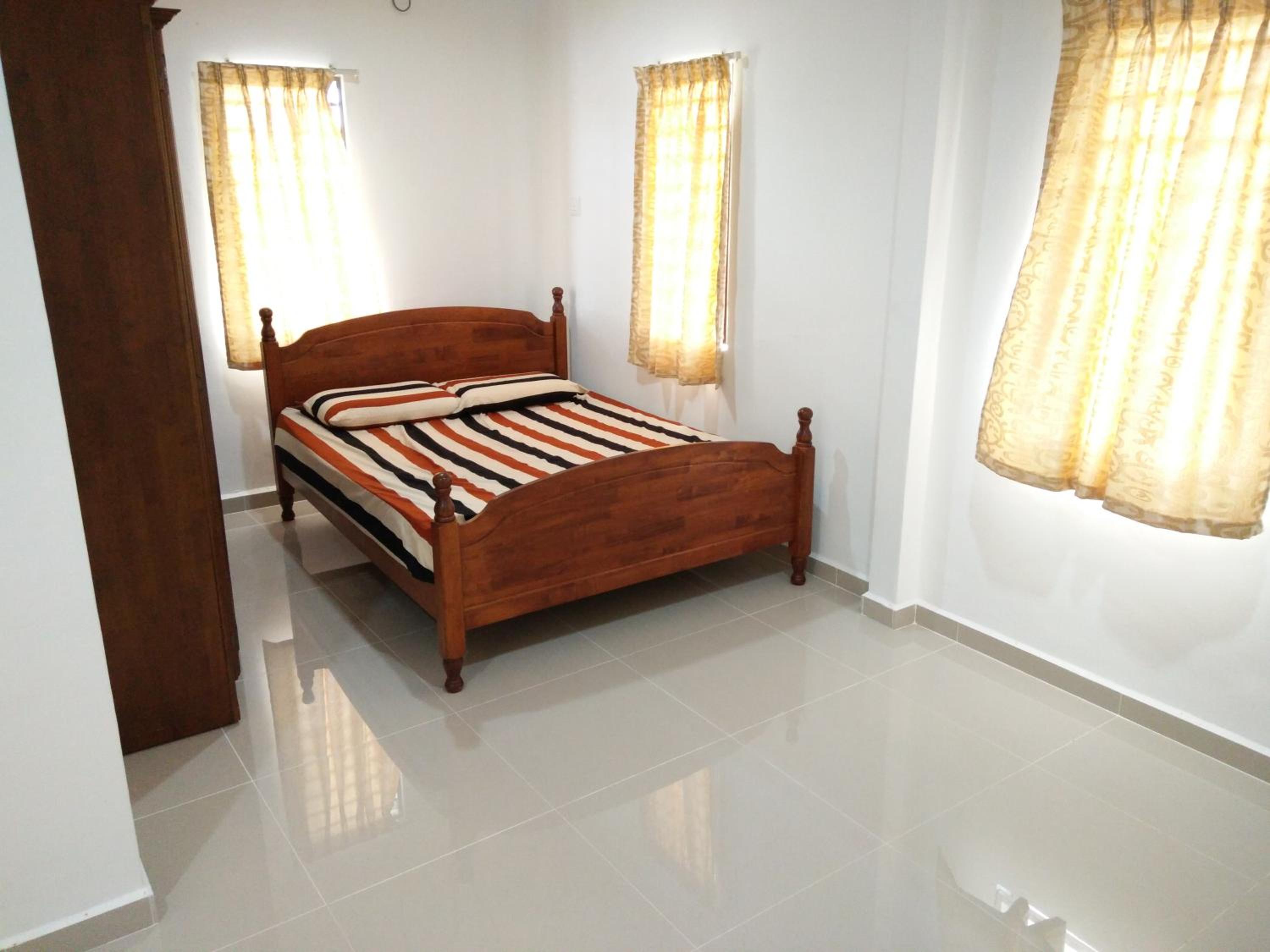 Deluxe Double Room (2 Adults + 1 Child) photo 1