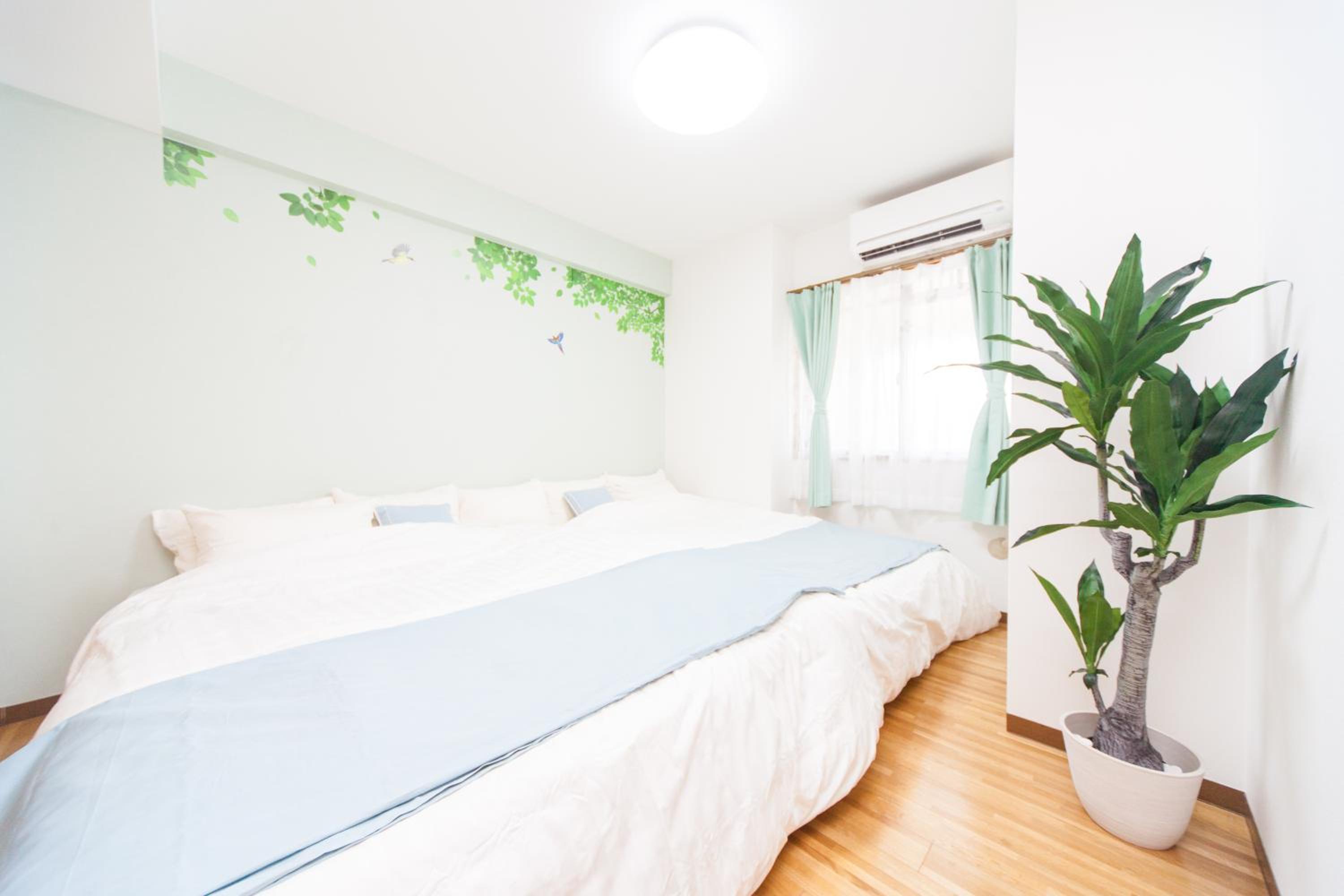 Three-Bedroom Apartment - Photo 50