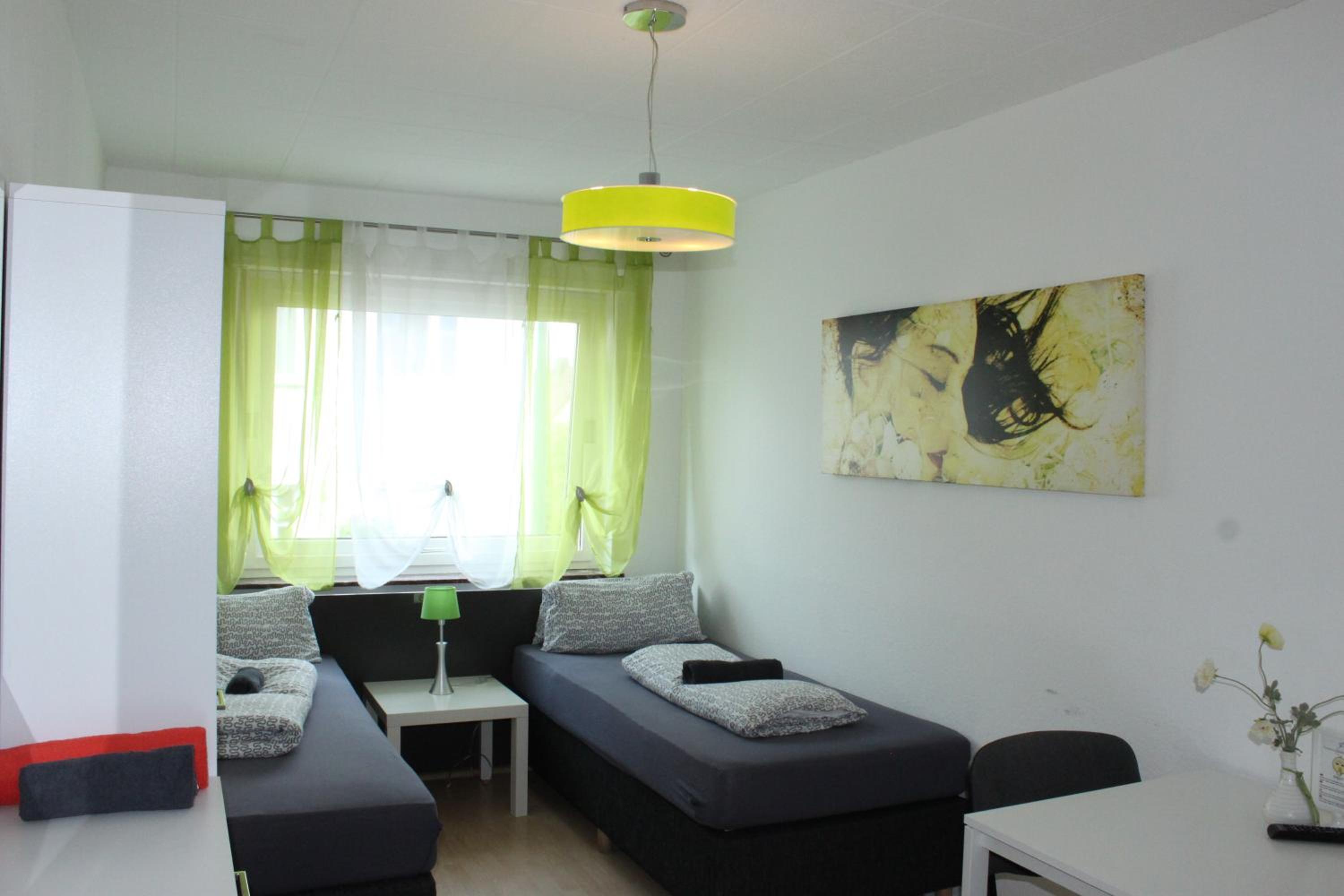Three-Bedroom Apartment photo 1