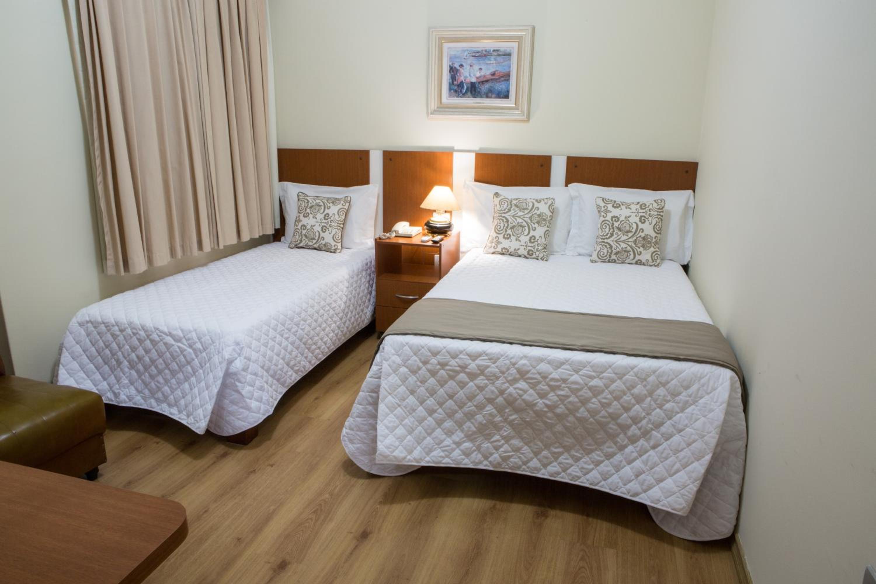Triple Room single bed photo 1