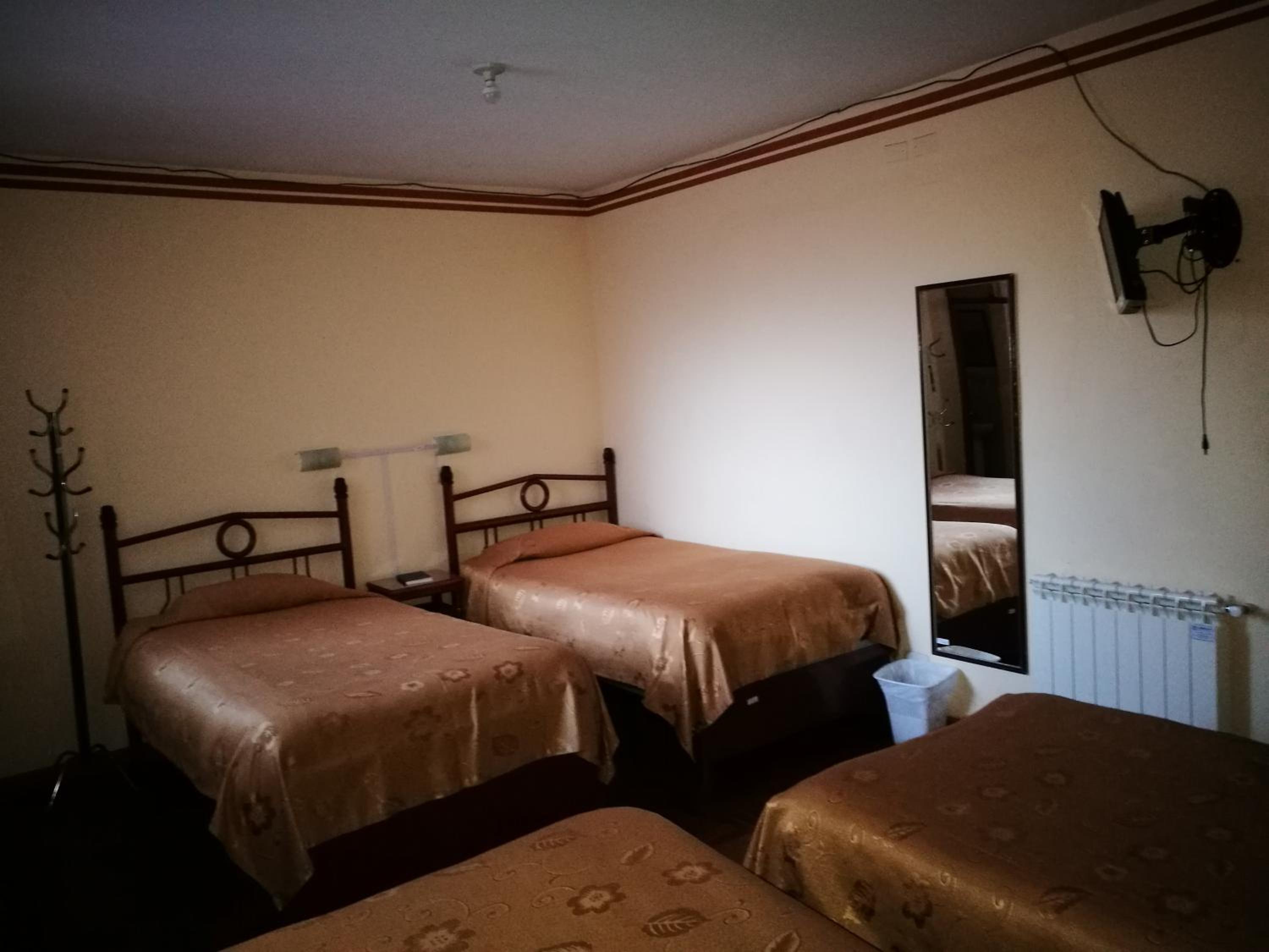 Quadruple Room with Private Bathroom photo 3