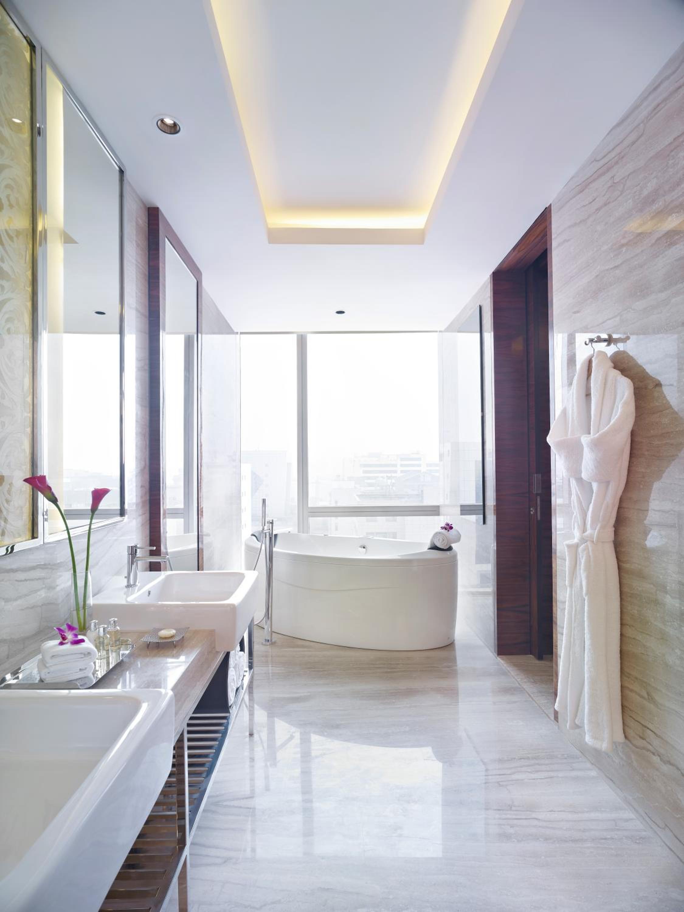 Executive Suite with One way airport transfer, Butler service on request.02 Pcs of Ironing per day,20 % disc on FNSB,SPA & transportation, Cocktail Hours @ Club Lounge from 18:00 hrs to 20:00 hrs, 2 hours of boardroom usage per stay subject to avl