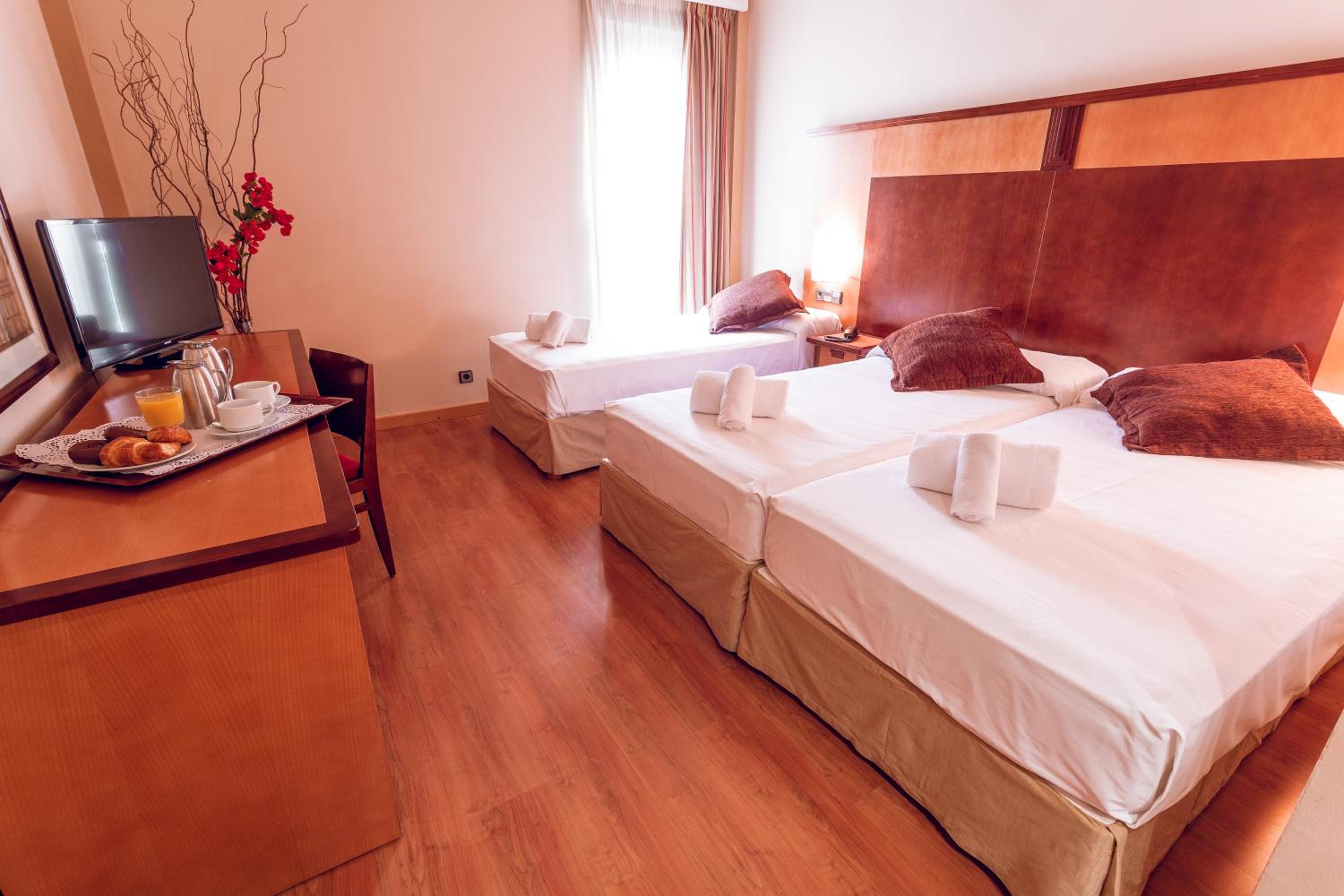 Triple Room - Photo 1