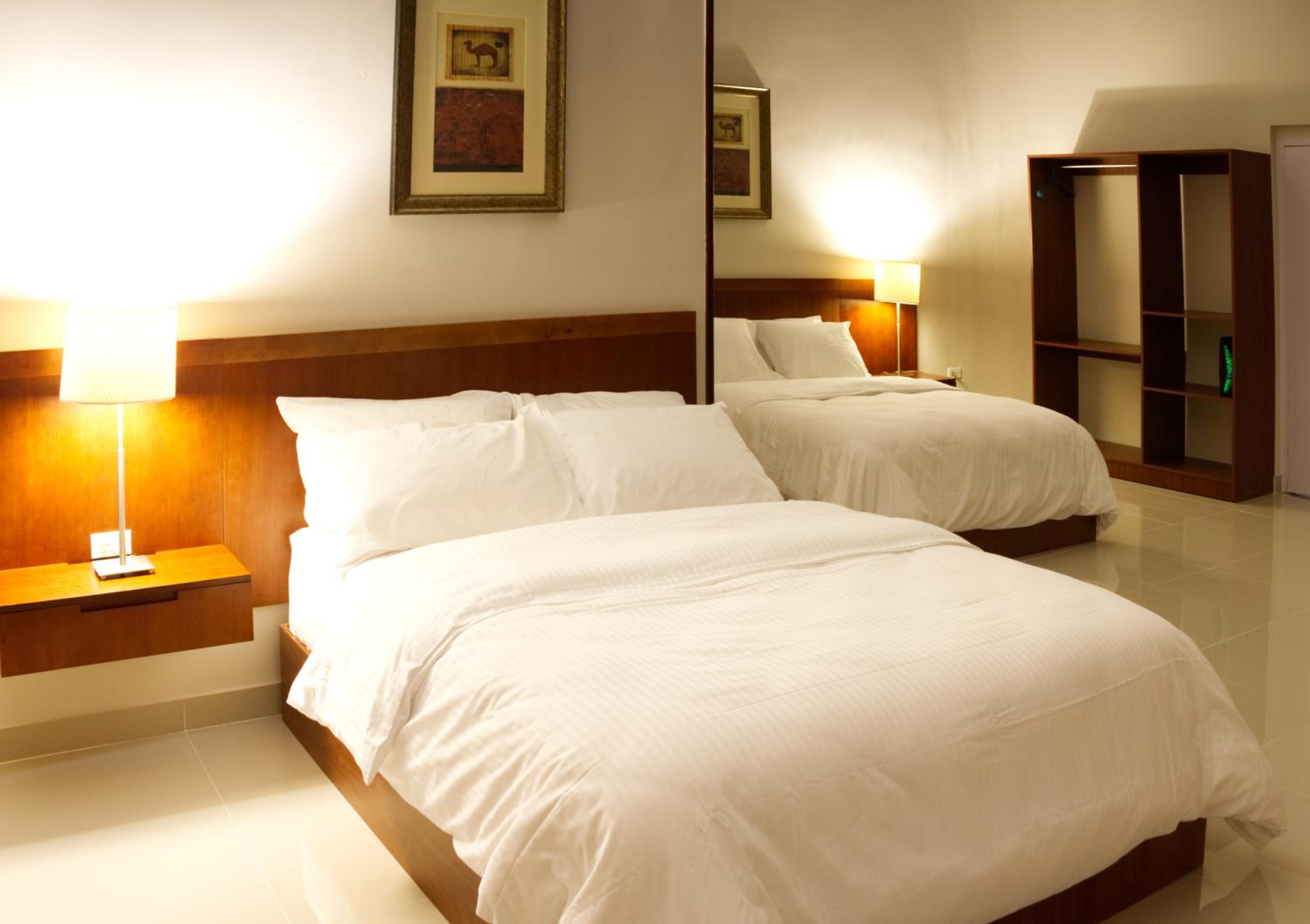 Deluxe Queen Room with Two Queen Beds photo 1
