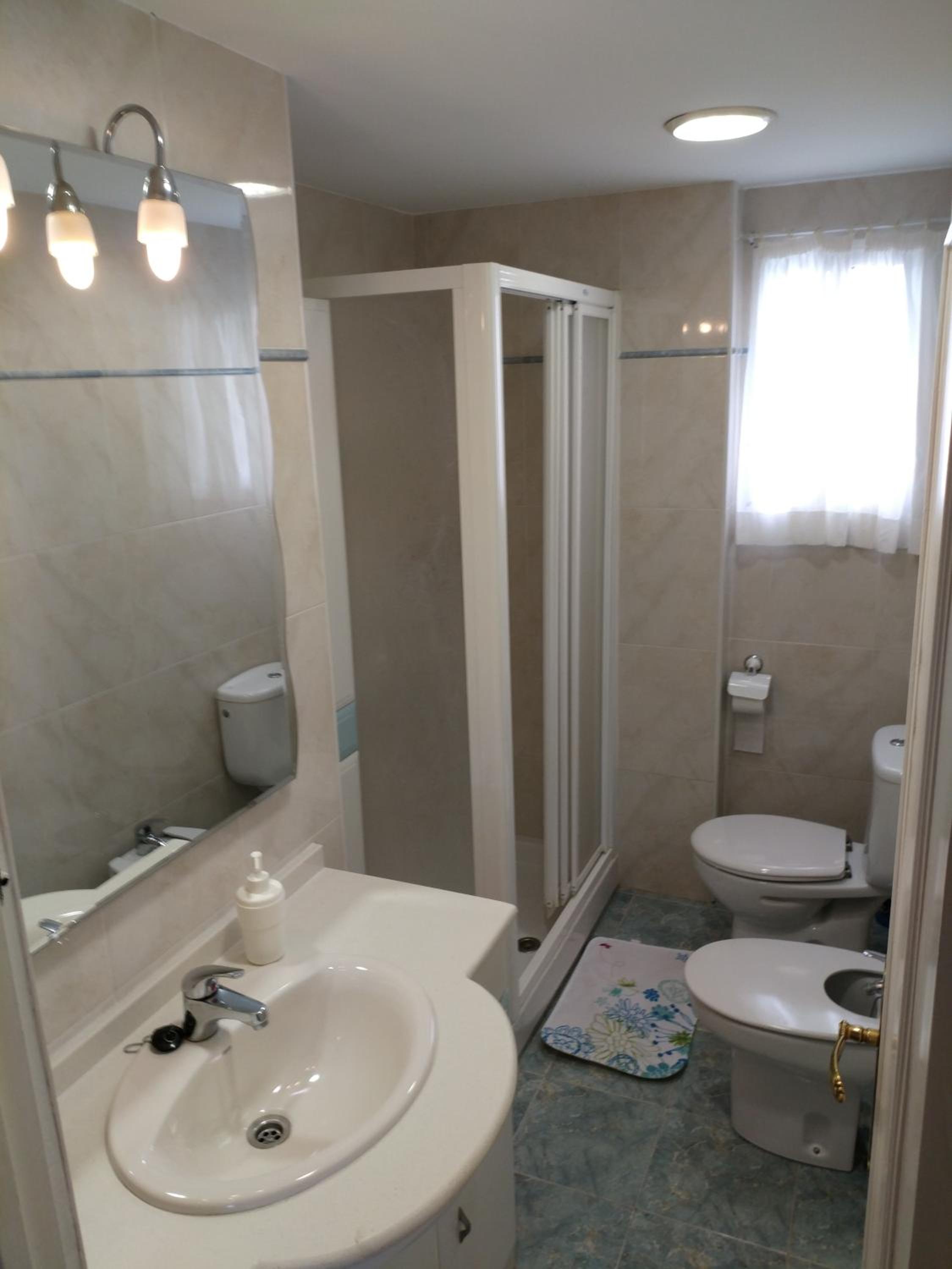 Three-Bedroom Apartment photo 2