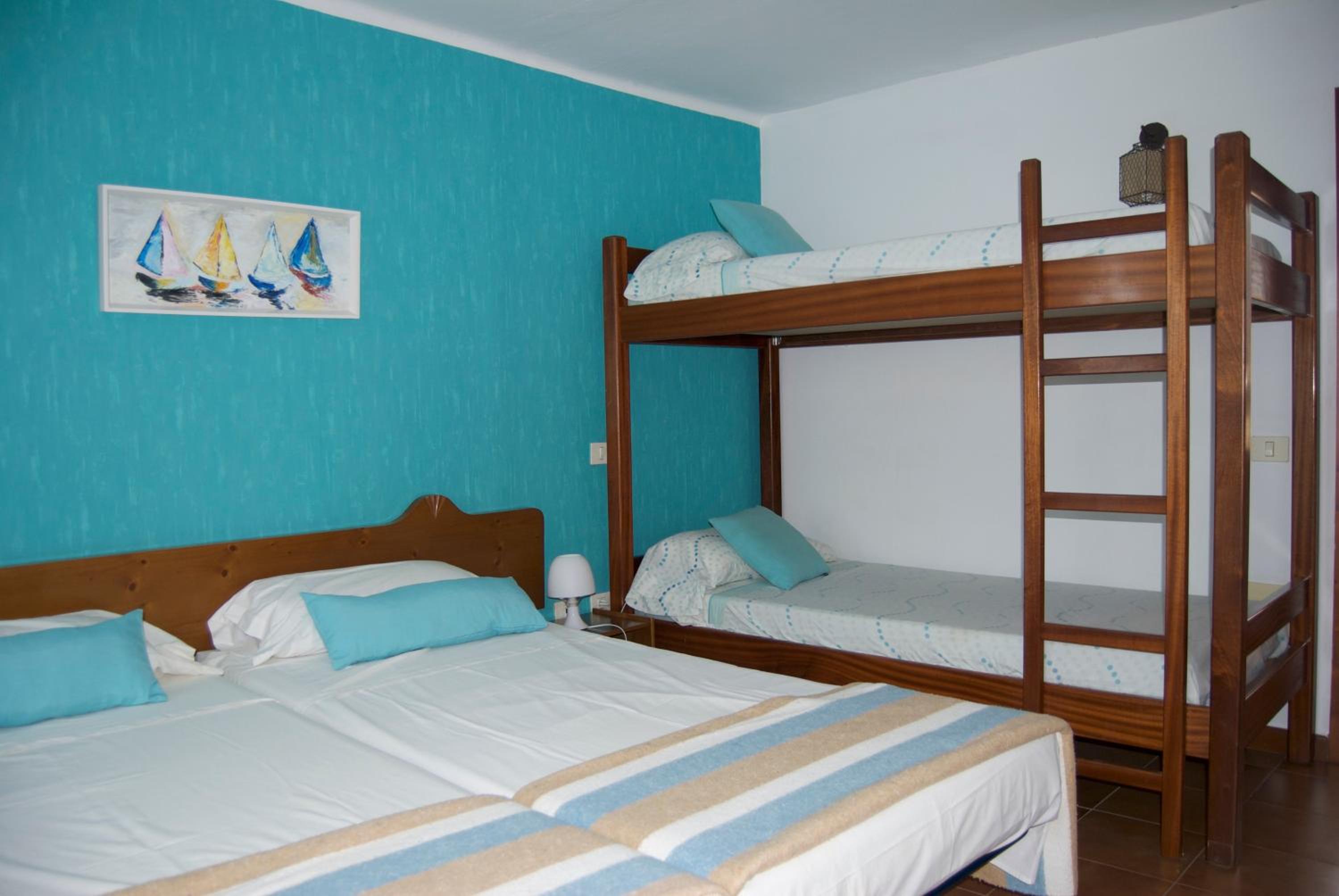 Habitación Cuádruple con Baño Privado