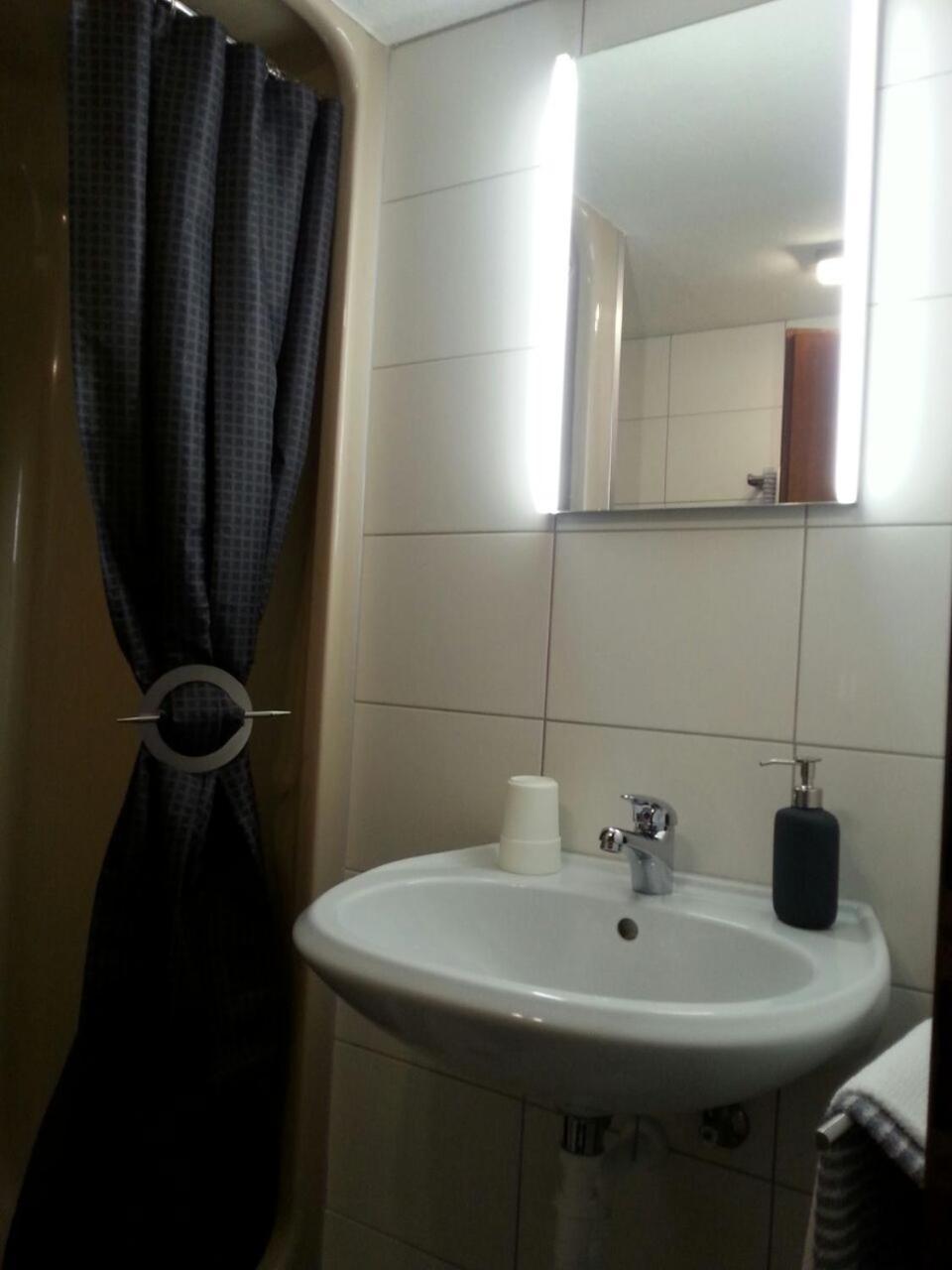 Apartment with Shower - Photo 3