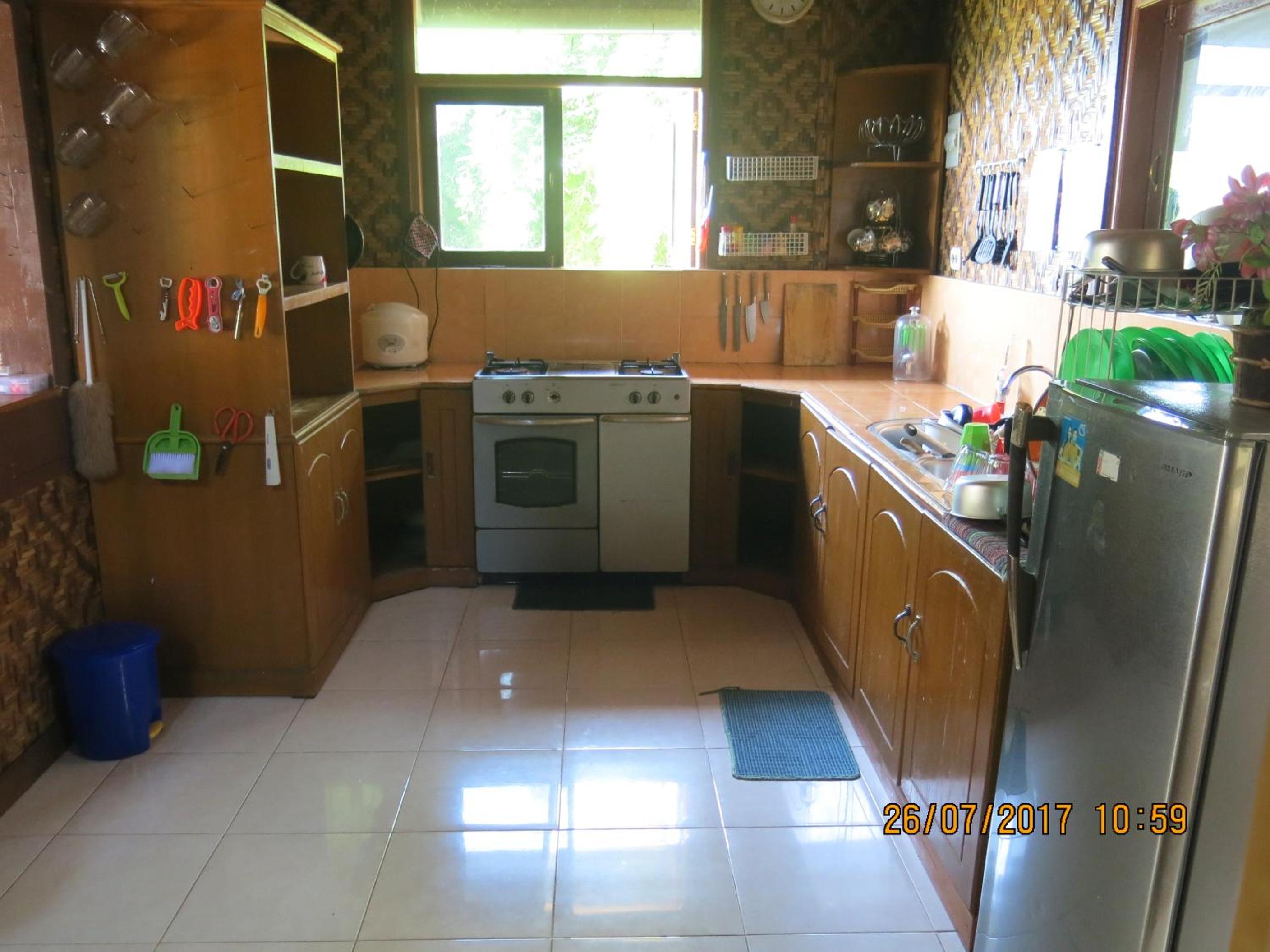 Three-Bedroom House - Photo 25