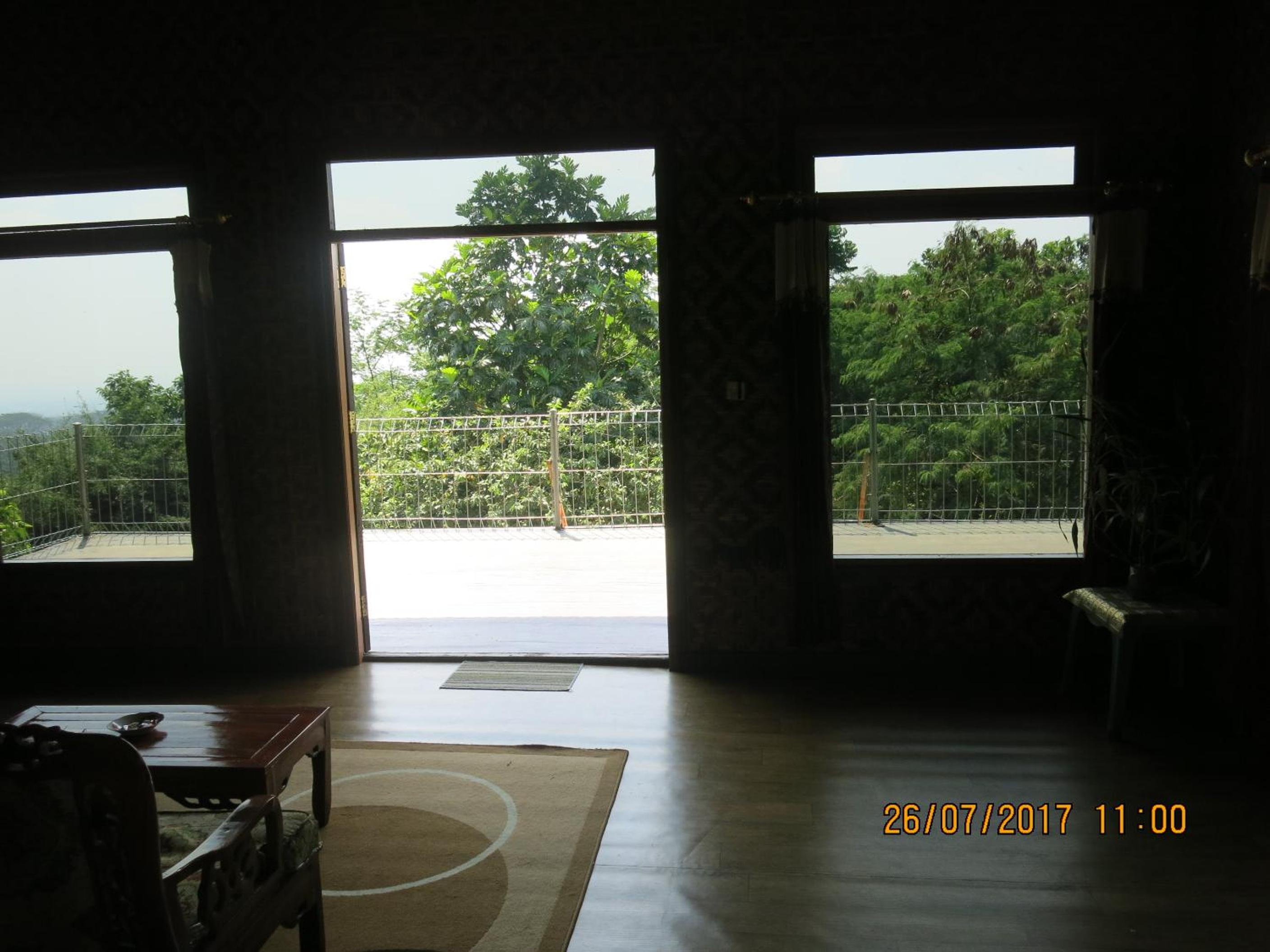 Three-Bedroom House - Photo 24