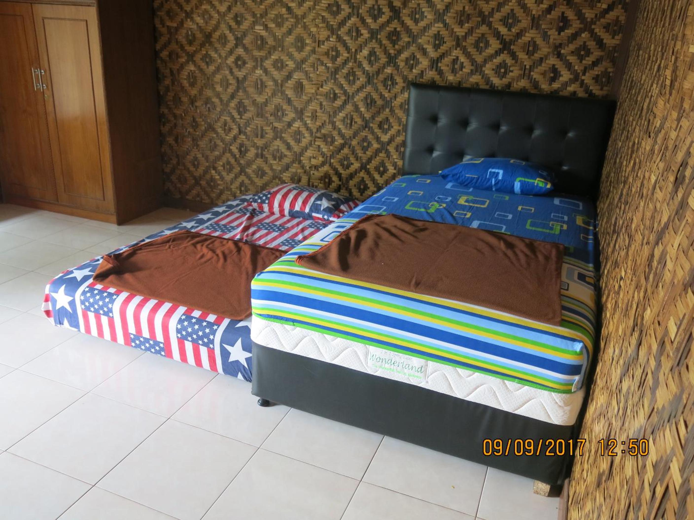 Three-Bedroom House - Photo 23