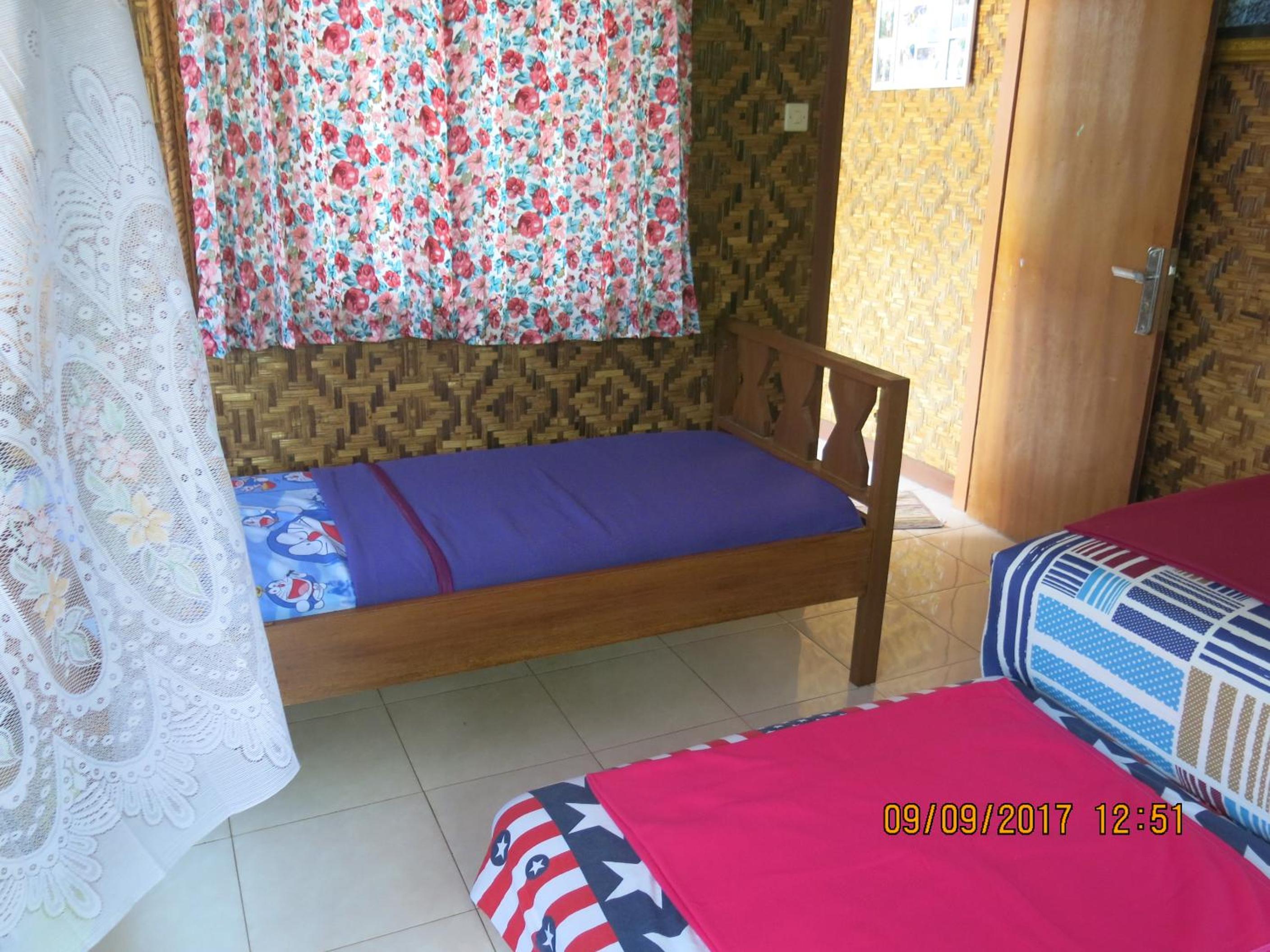 Three-Bedroom House - Photo 18