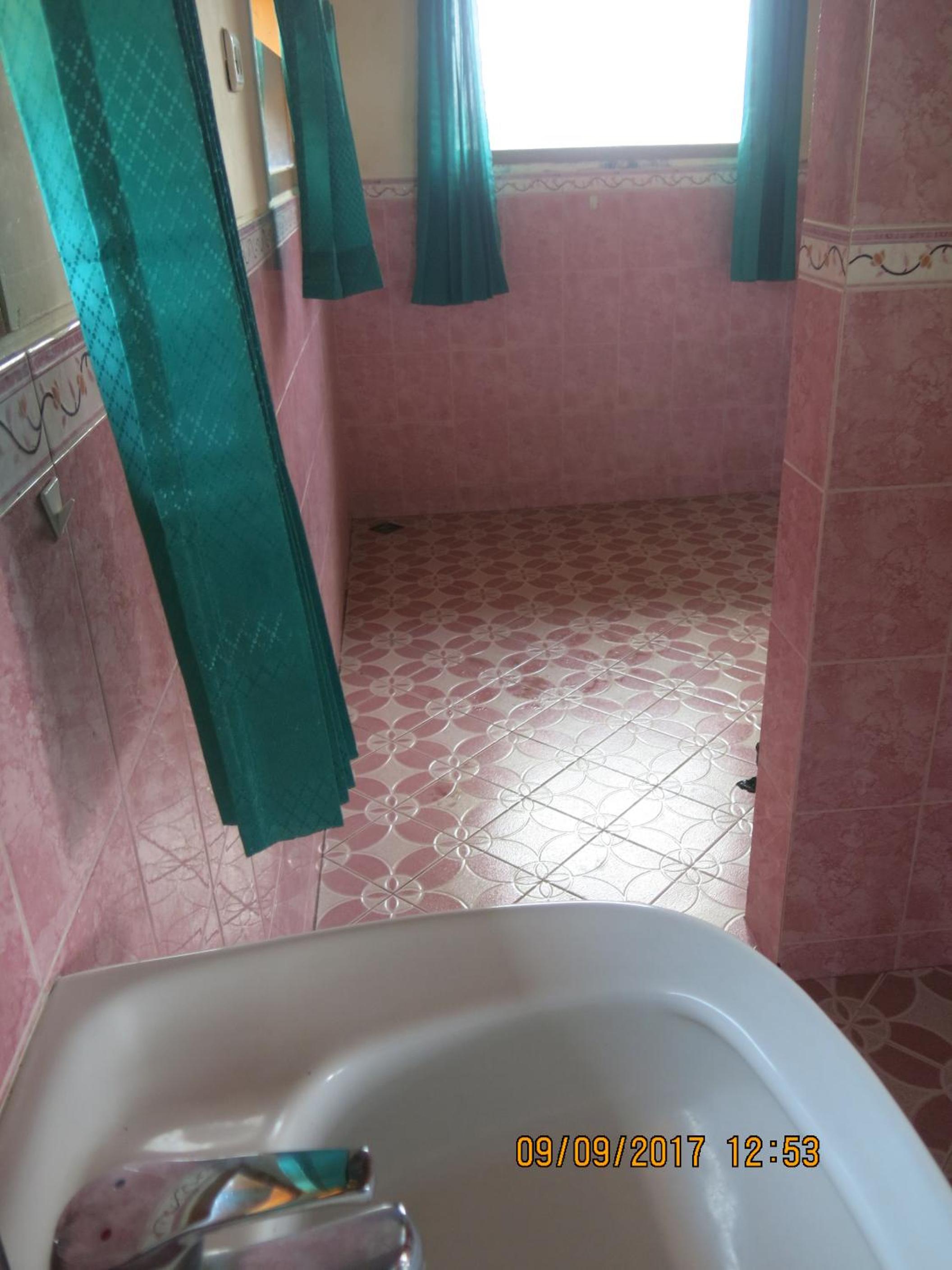 Three-Bedroom House - Photo 11