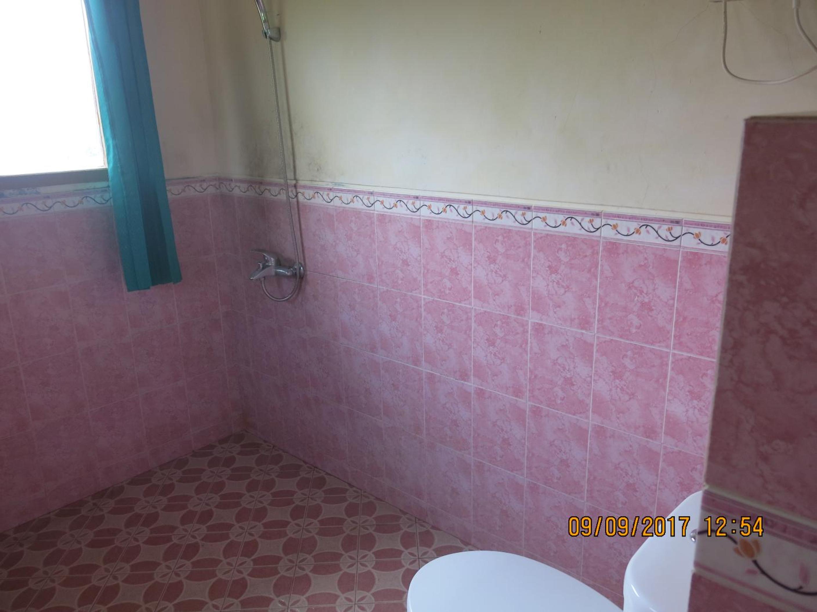 Three-Bedroom House - Photo 10