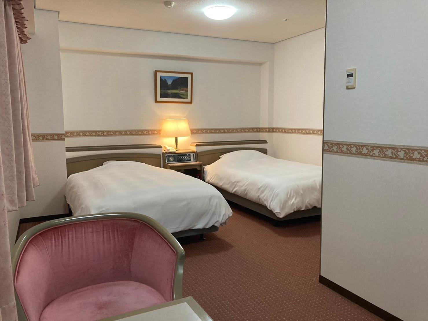 Twin Room - Non-Smoking photo 1