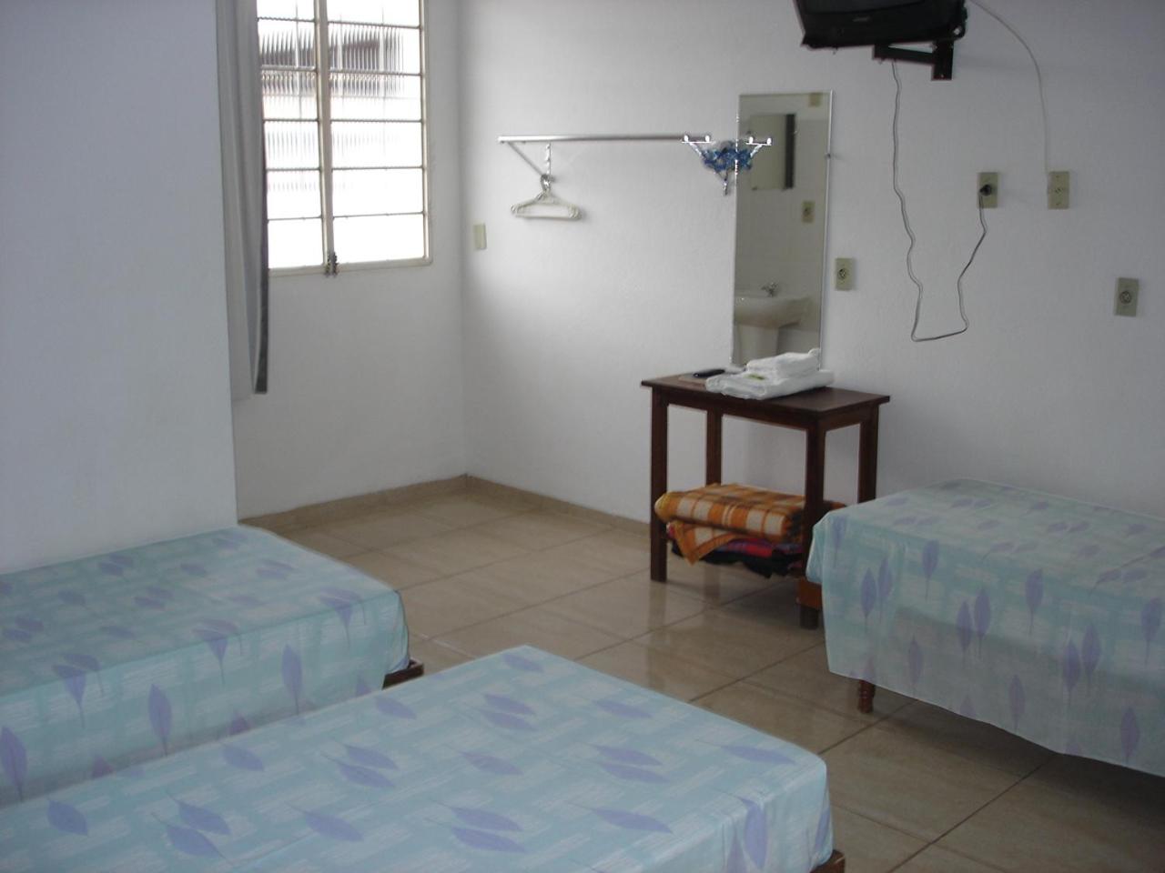 Economy Triple Room photo 2