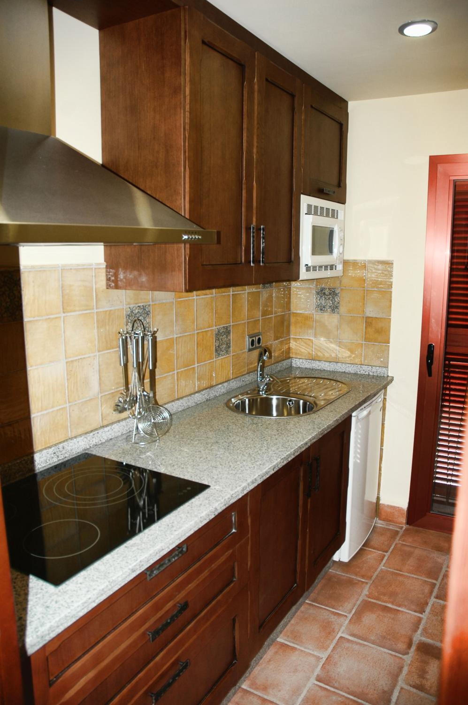Three-Bedroom Apartment - Photo 19