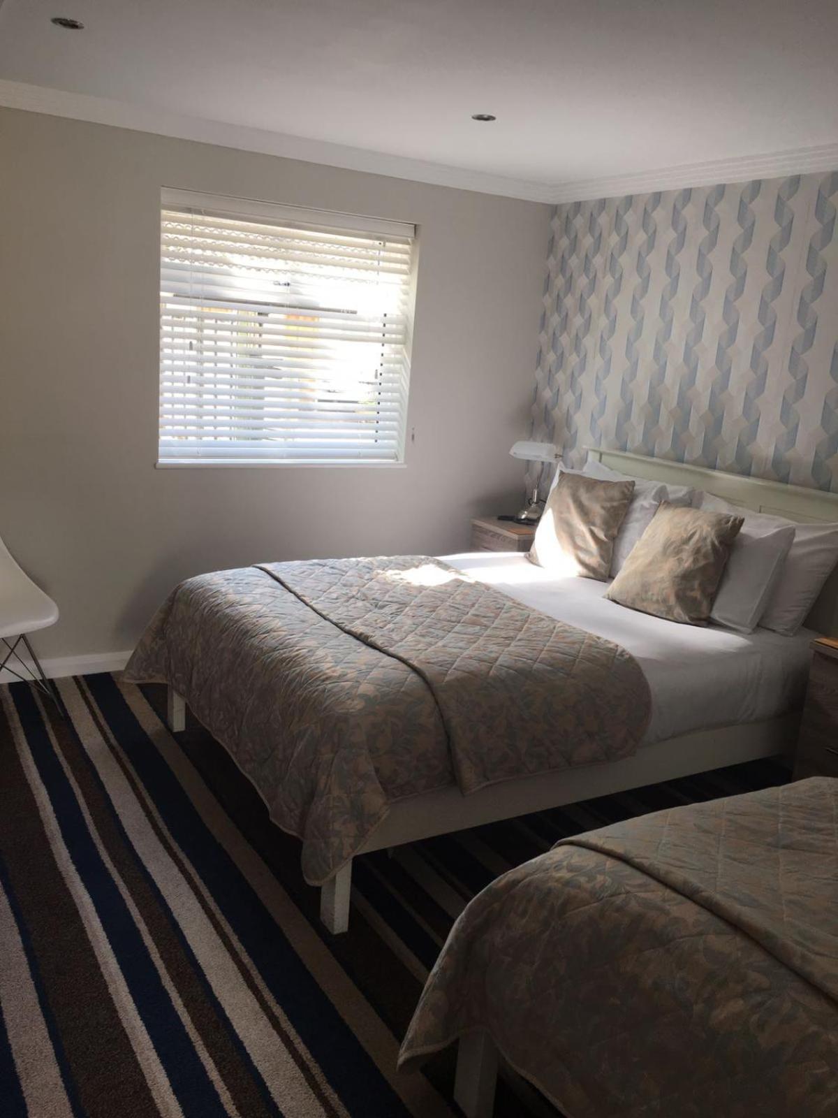 Family Room with Double and Single Beds - Non-Smoking photo 2