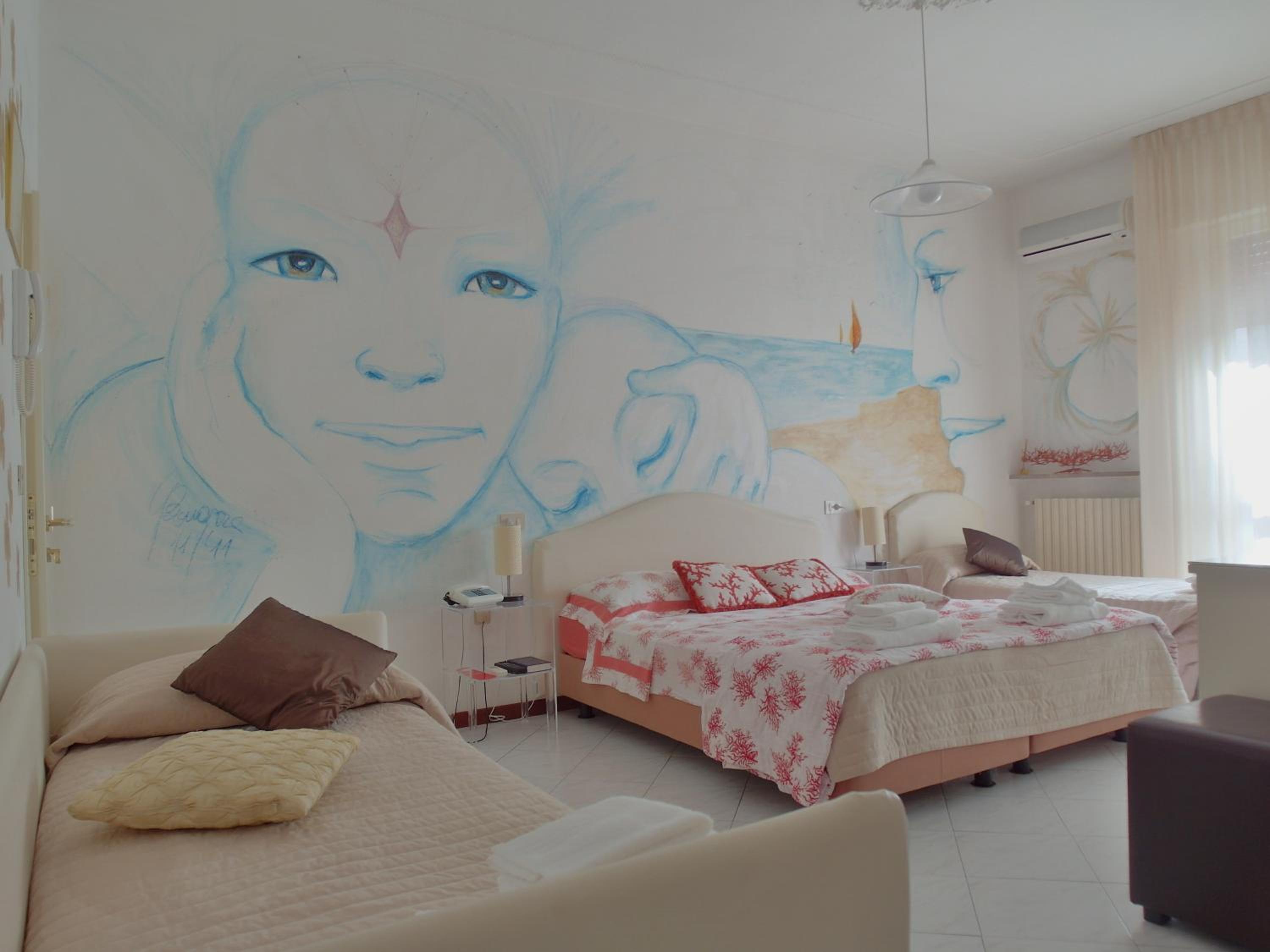 Quadruple Room with Balcony photo 1
