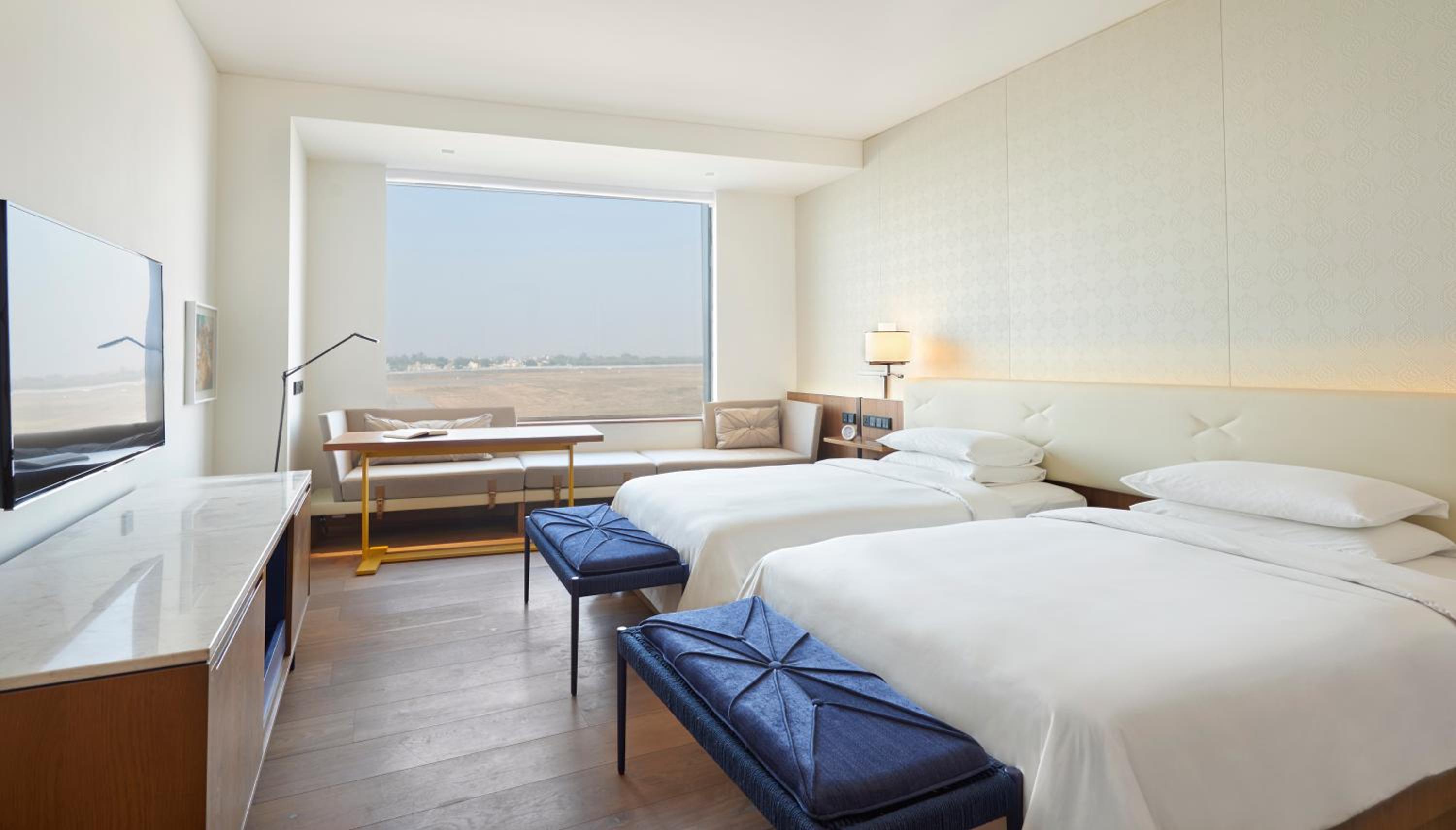 Twin Room with Runway View - Photo 1