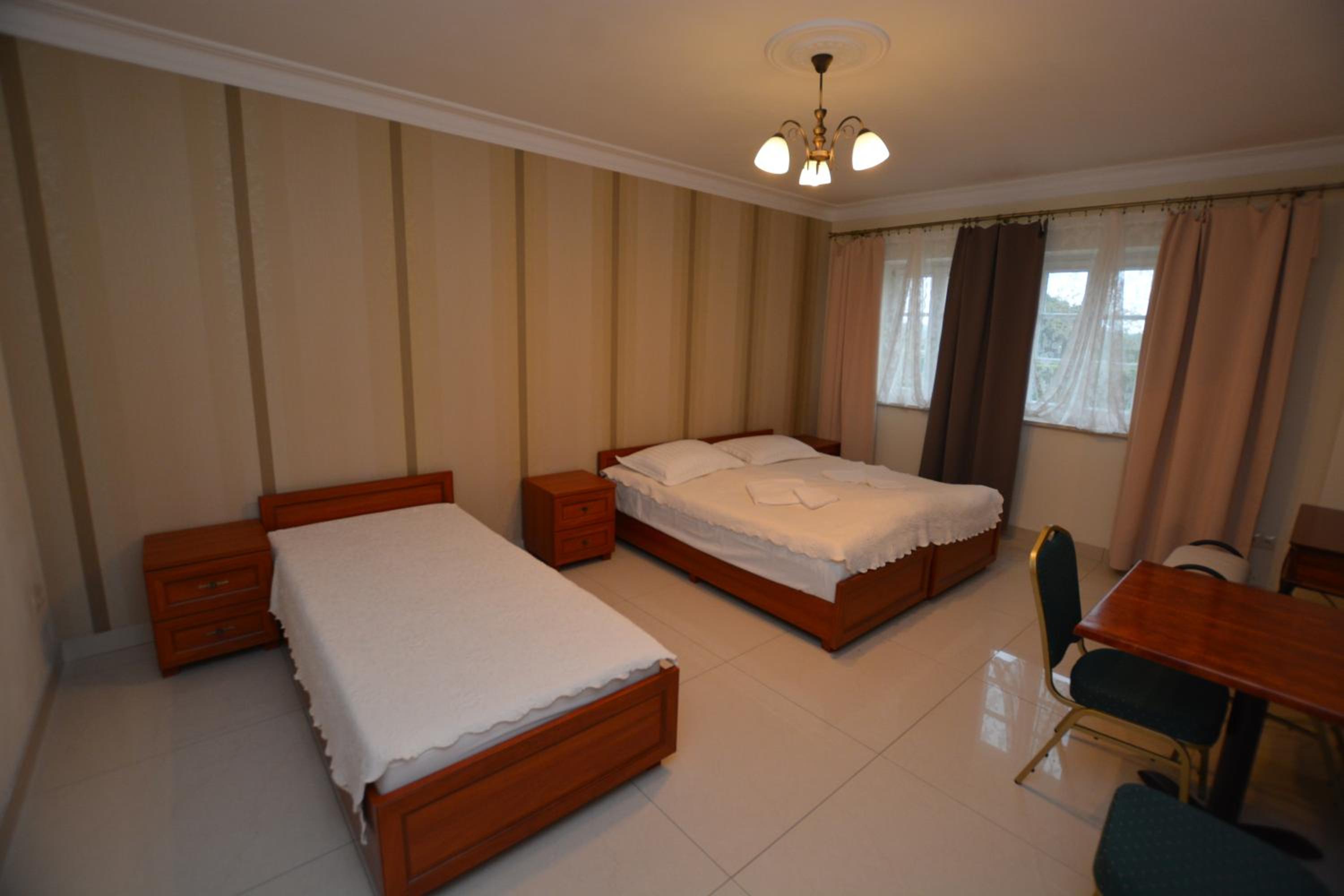 Basic Triple Room with Shared Bathroom photo 2