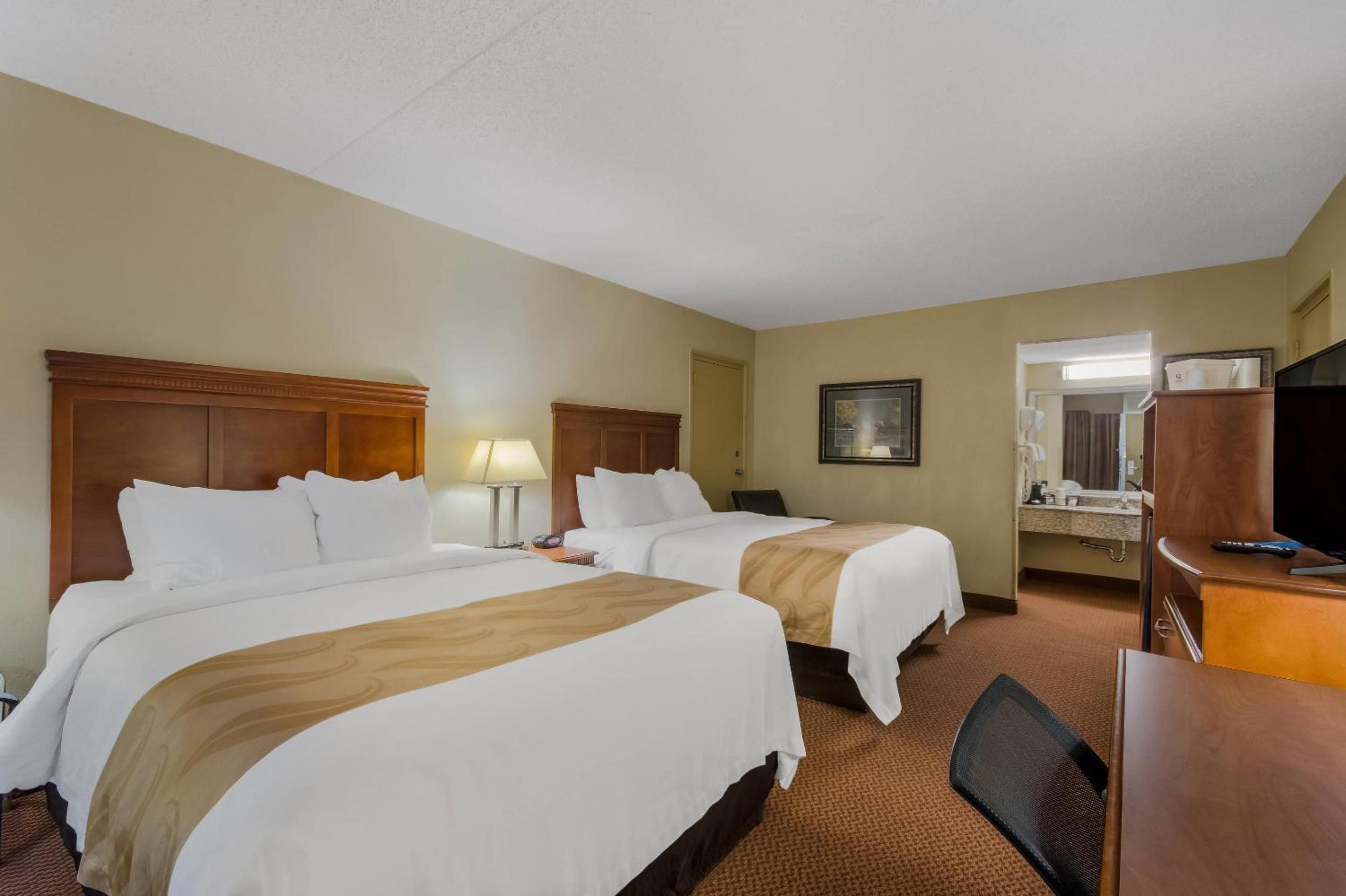 Quadruple Room with Two Queen Beds Poolside - Non Smoking
