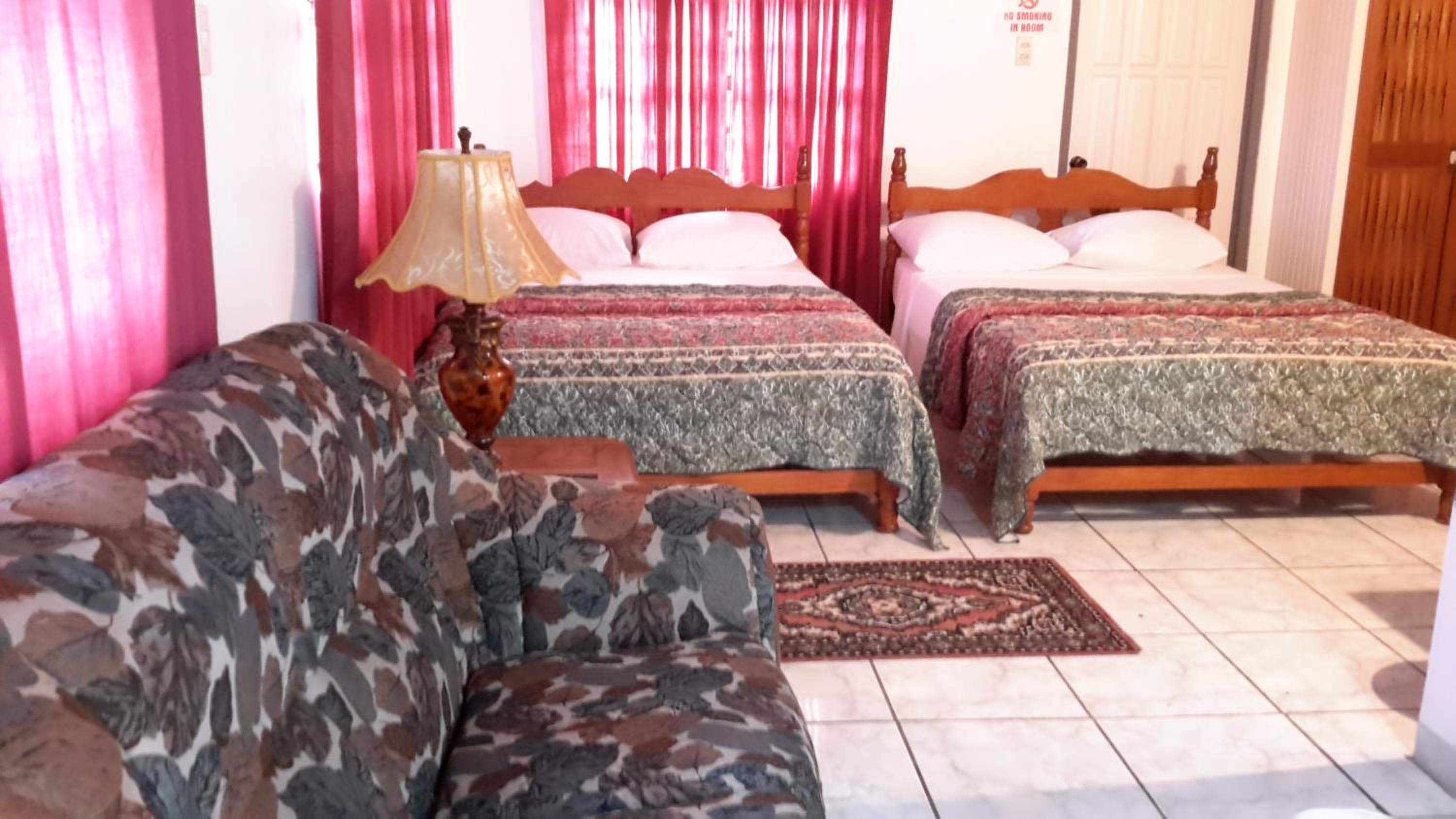Studio with Two Double Beds with Partial Sea View photo 1