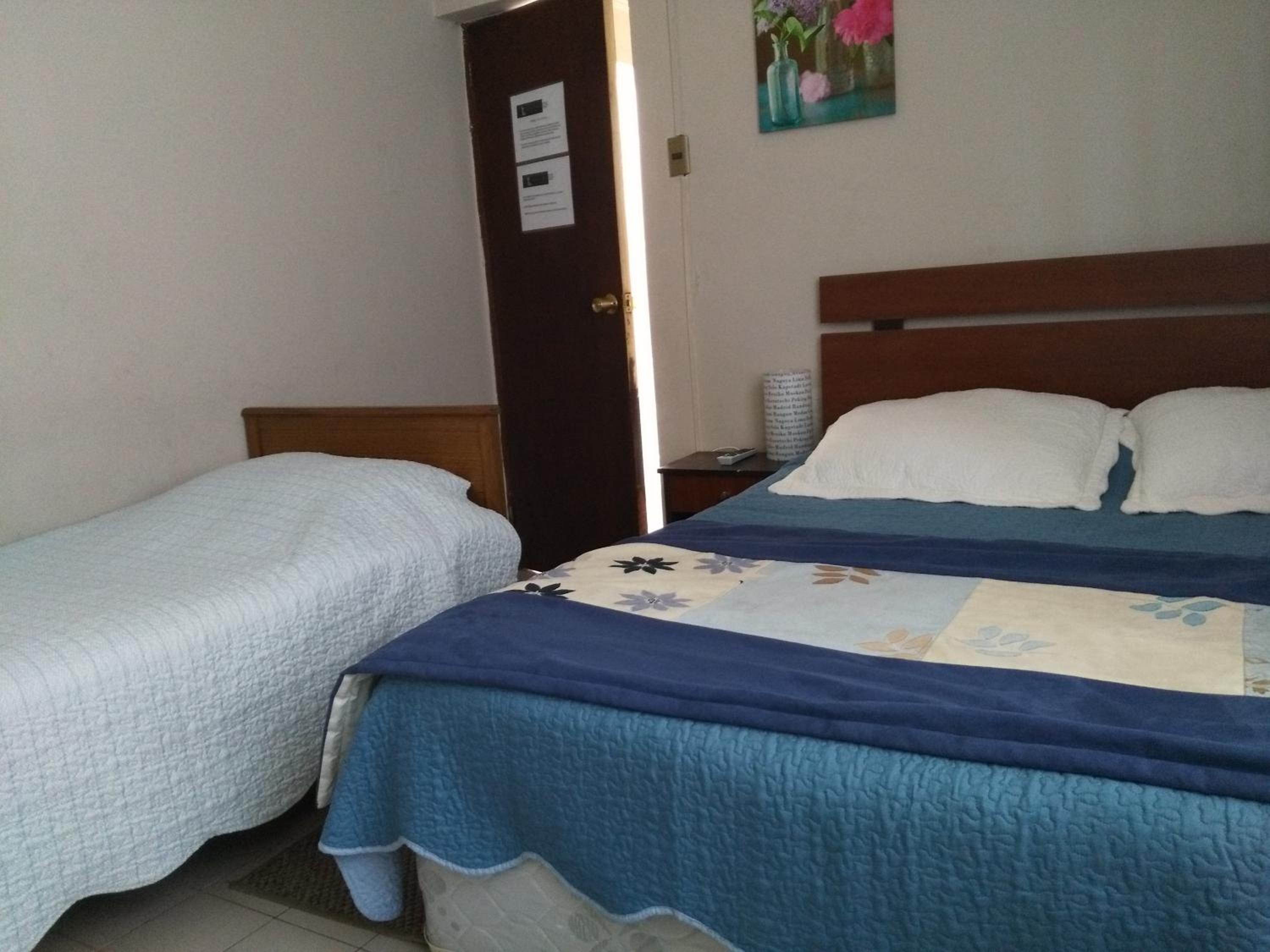 Standard Triple Room with Private Bathroom photo 1